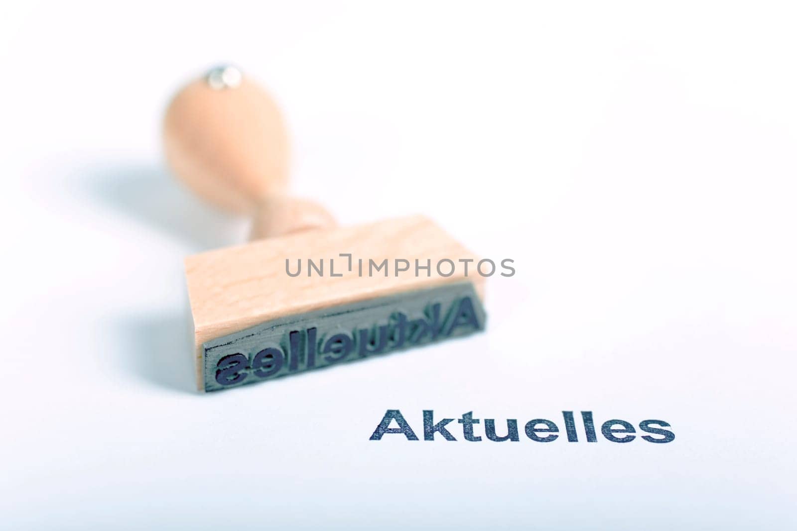 Wooden stamp with the word News