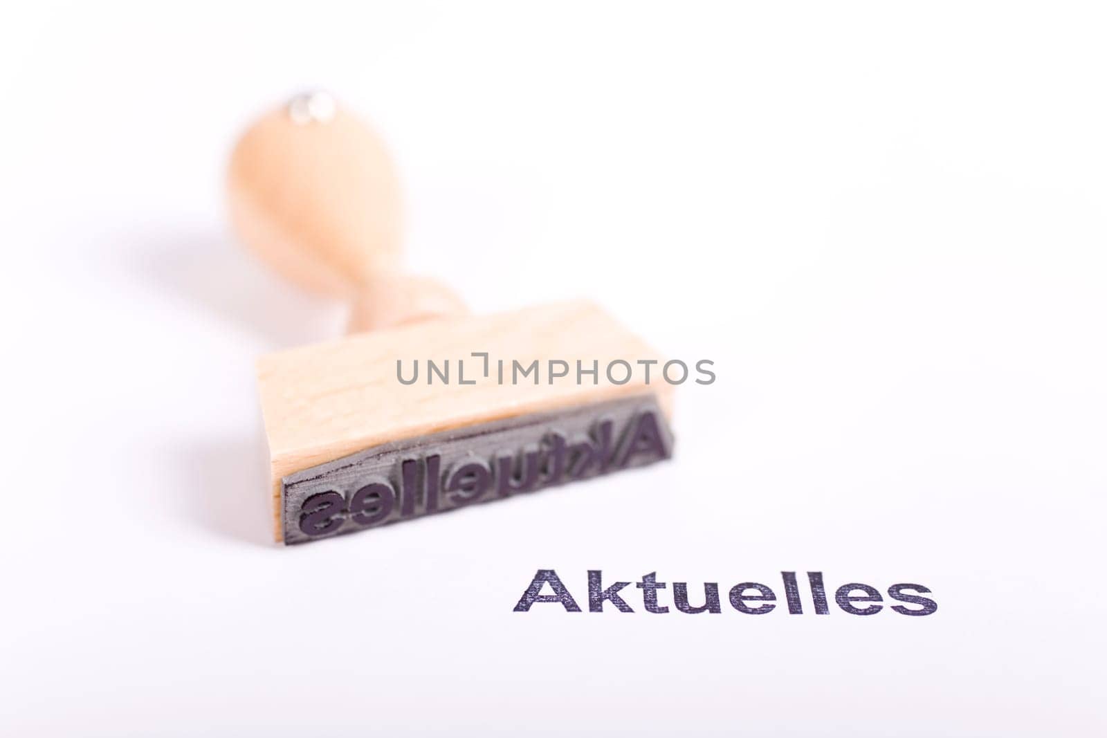 Wooden stamp with the word News