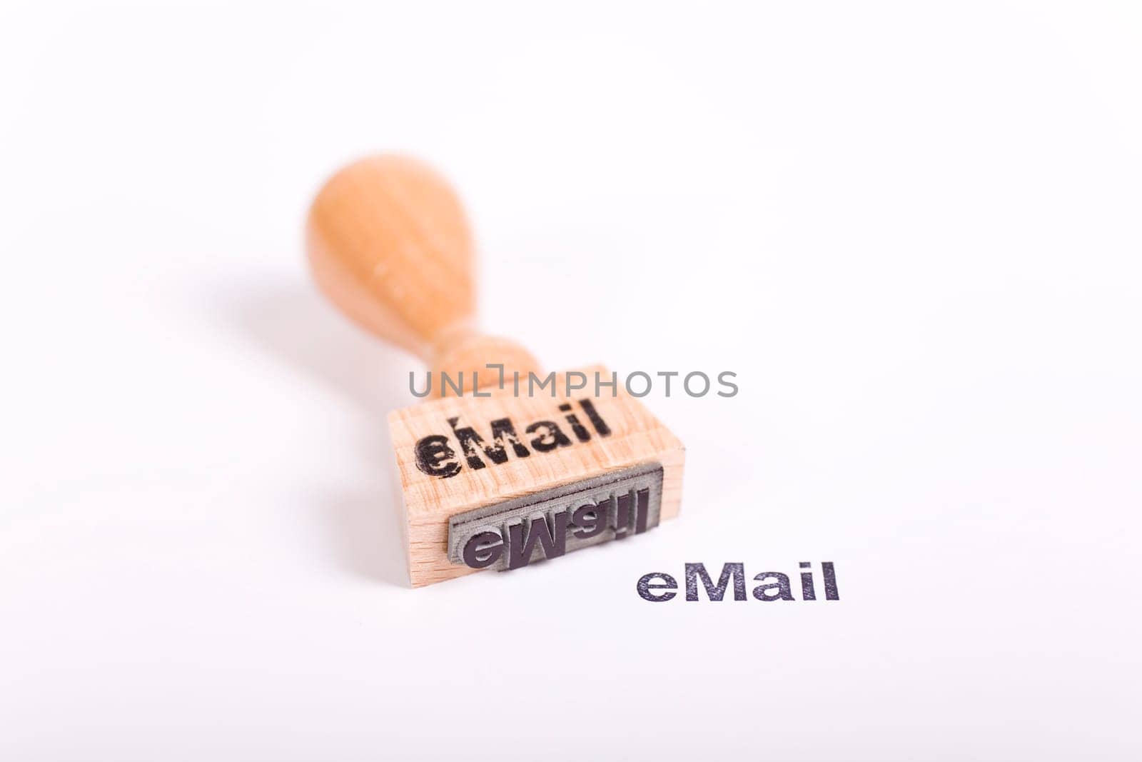 Wooden stamp with the word eMail