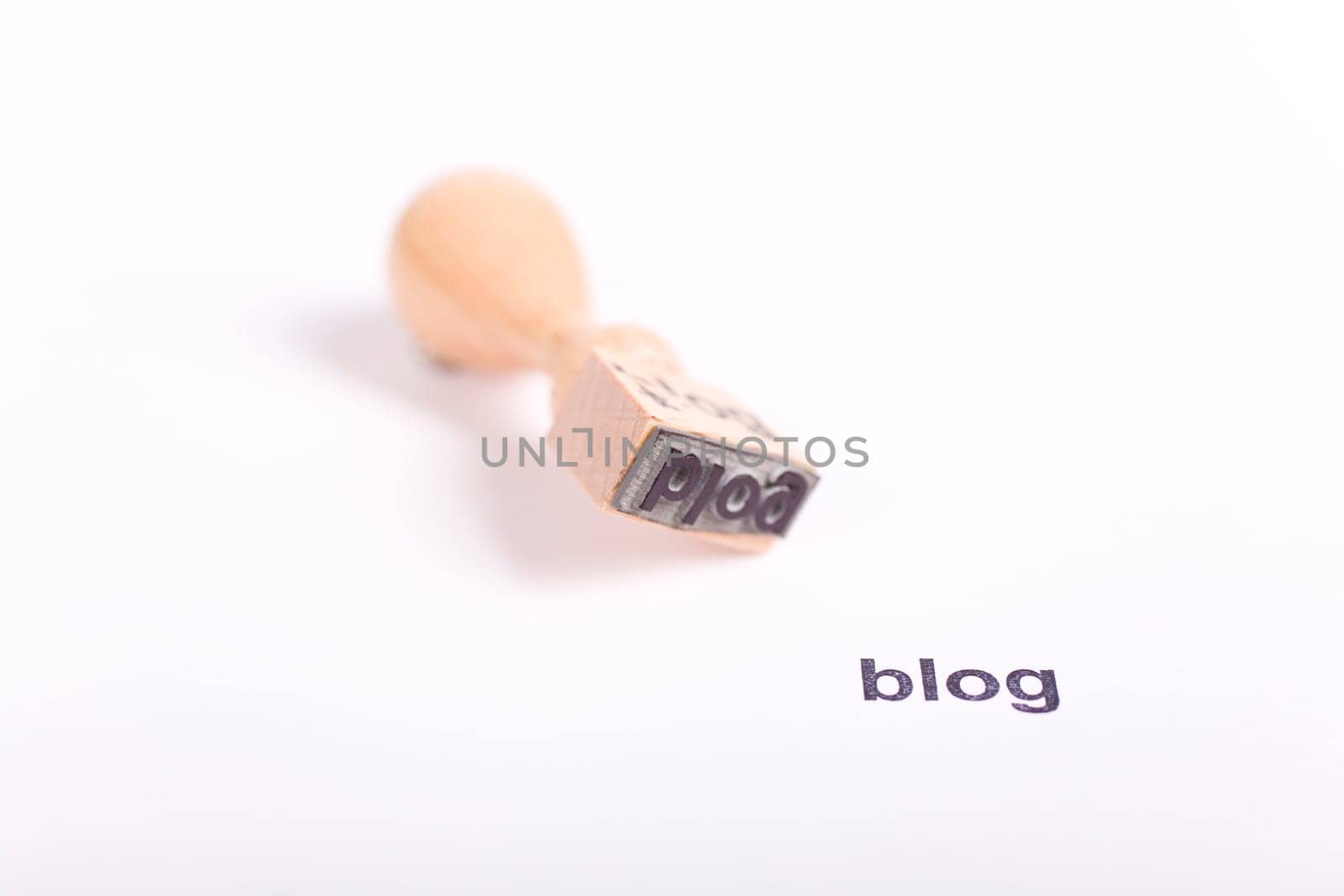 Wooden stamp with the word blog