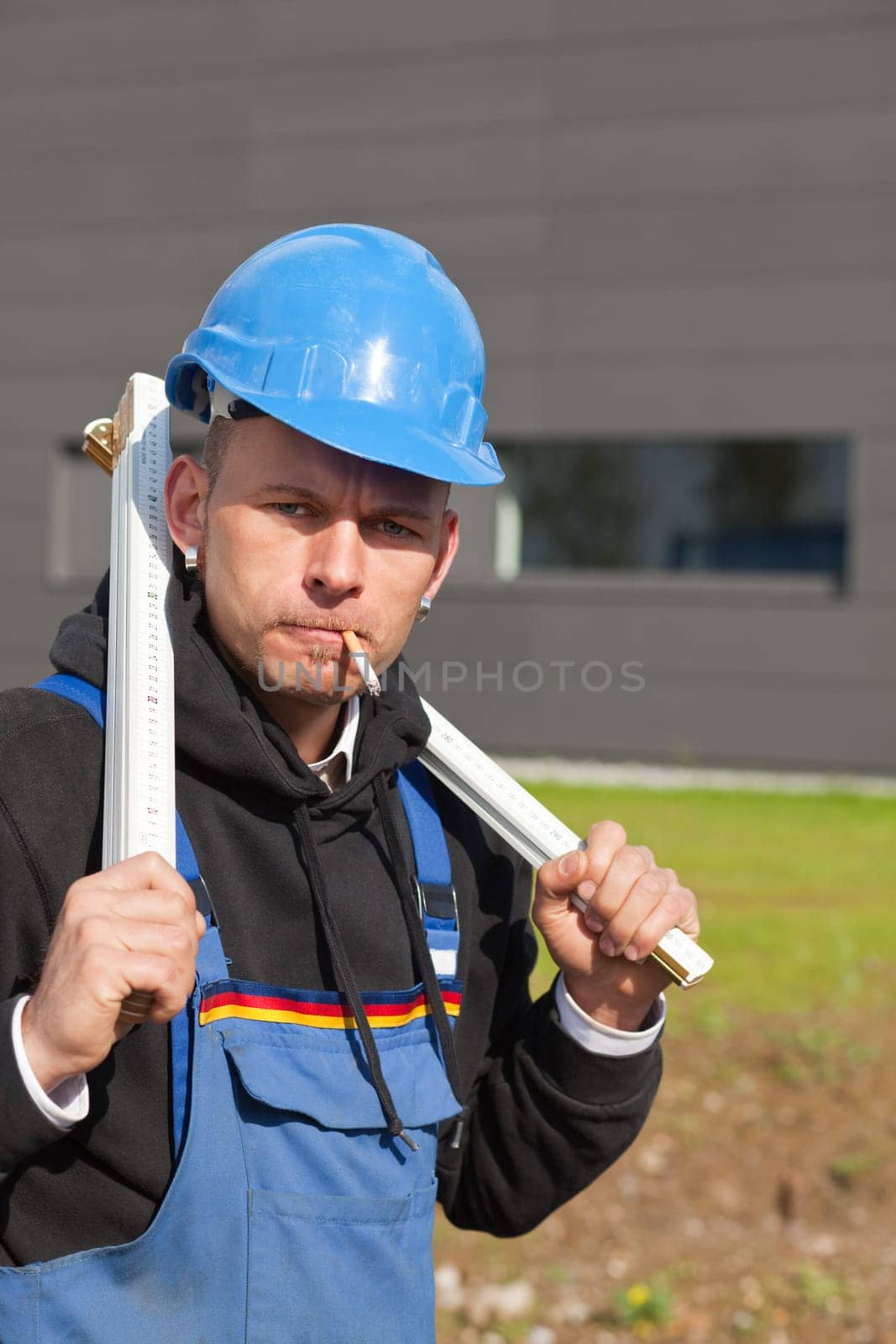 worker with folding ruler