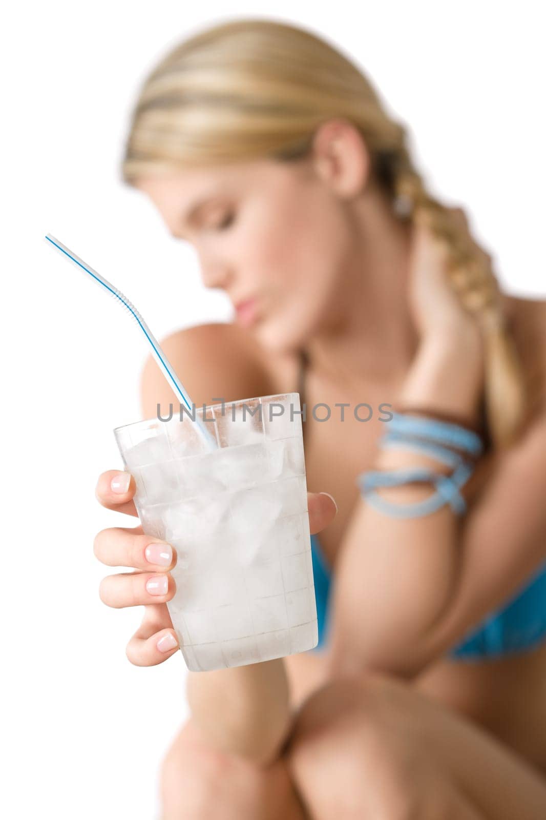 Beach - Young woman in bikini with drink