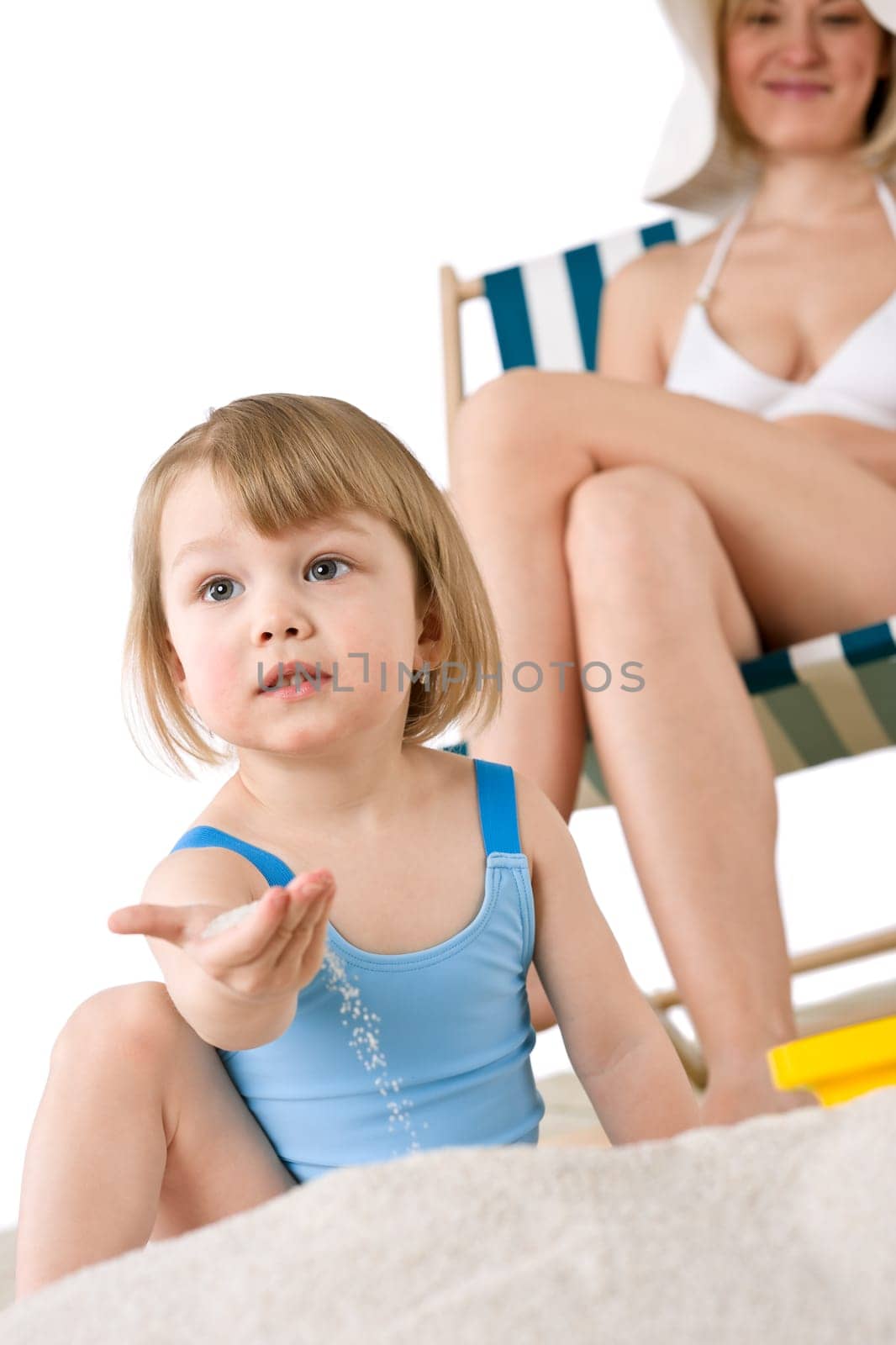 Beach - Young woman with child