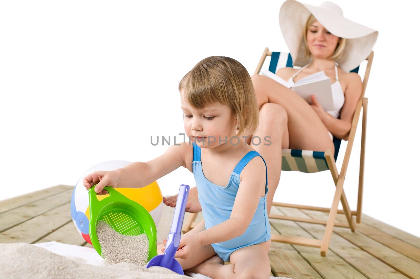 Beach - Young woman with child