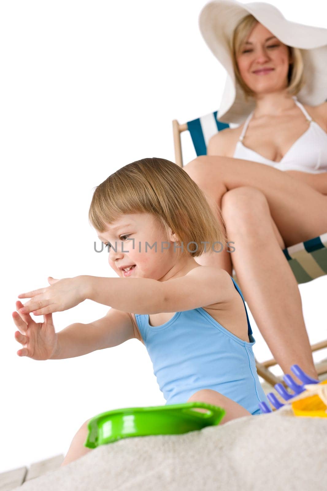 Beach - Young woman with child