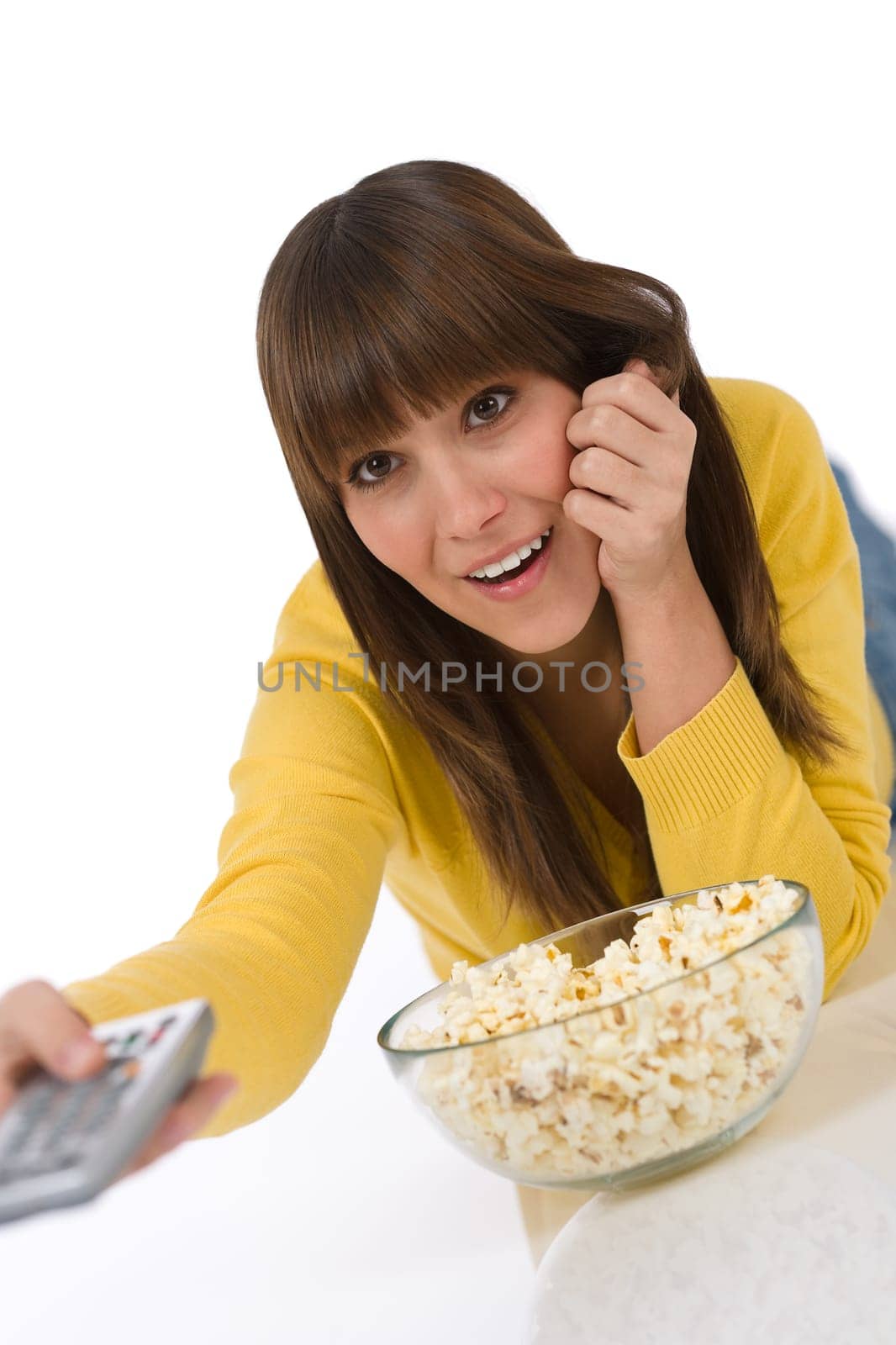 Female teenager watching television