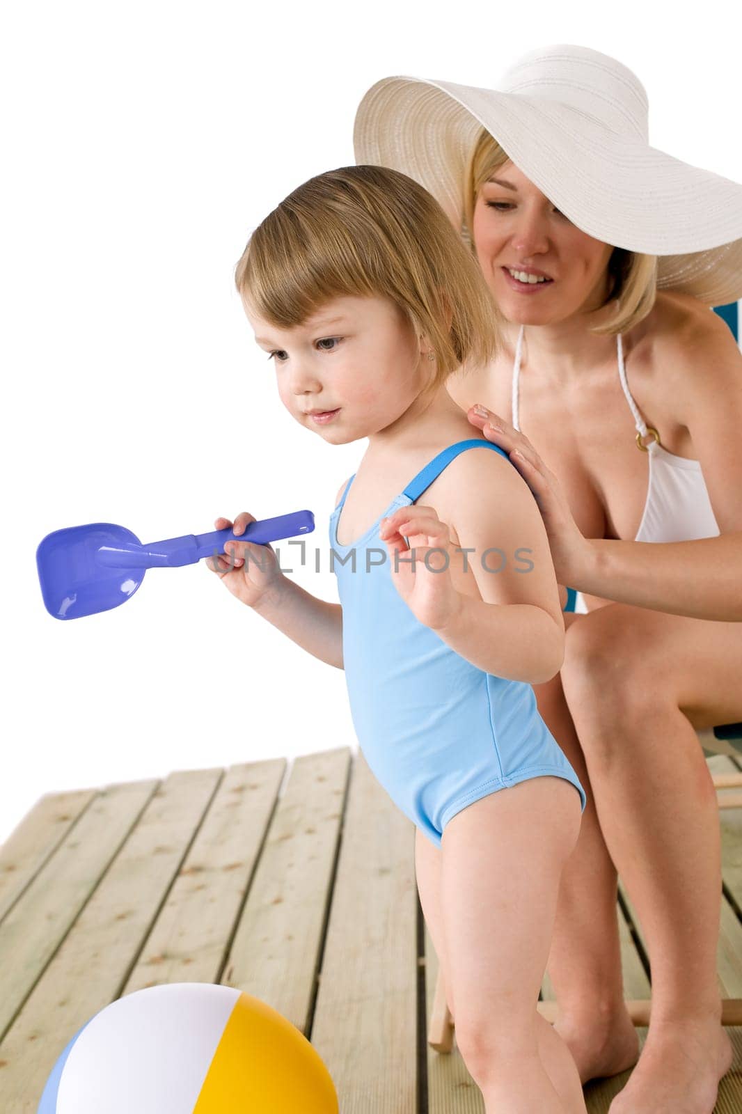 Beach - Mother with playing child