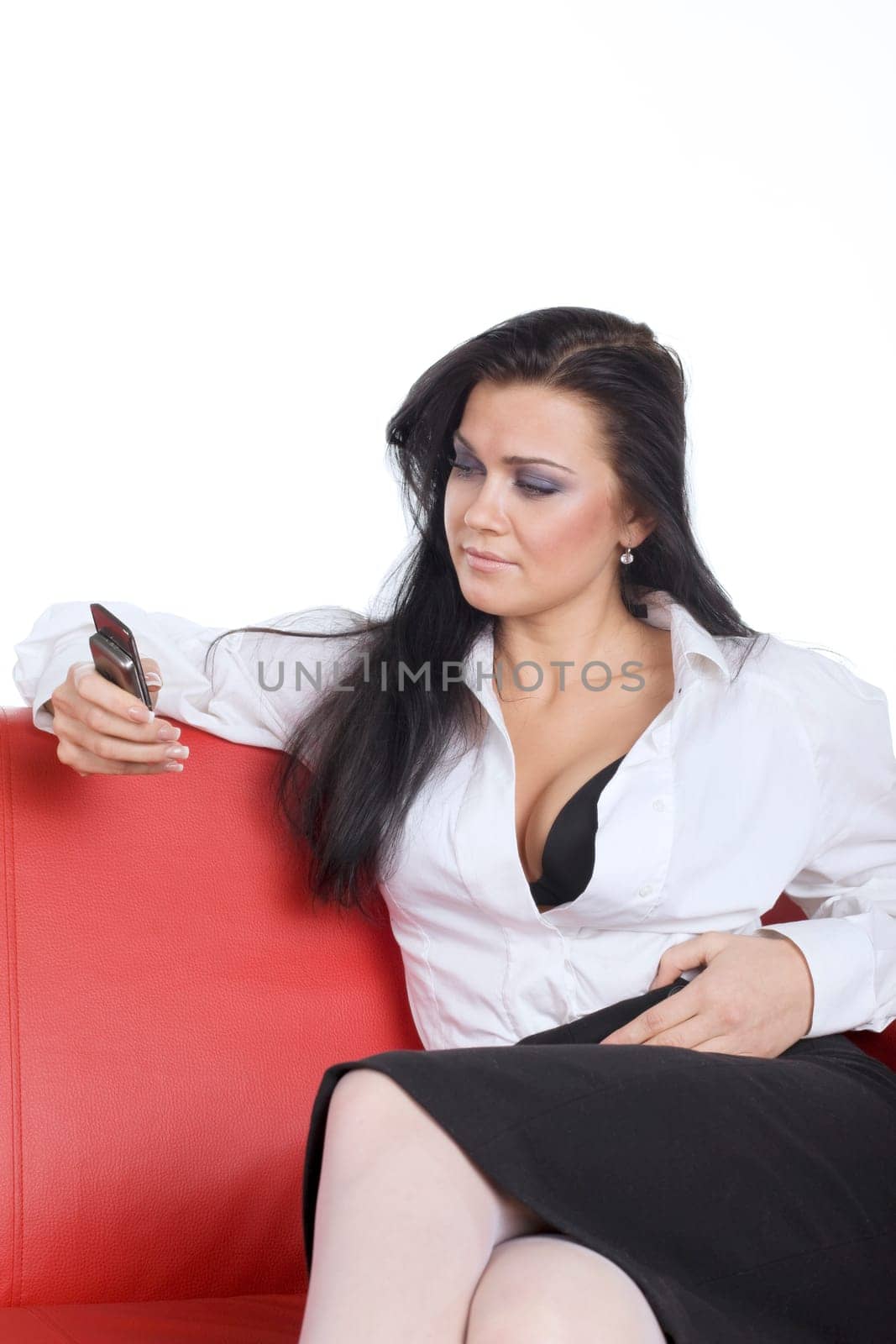 woman with open decollete look at phone