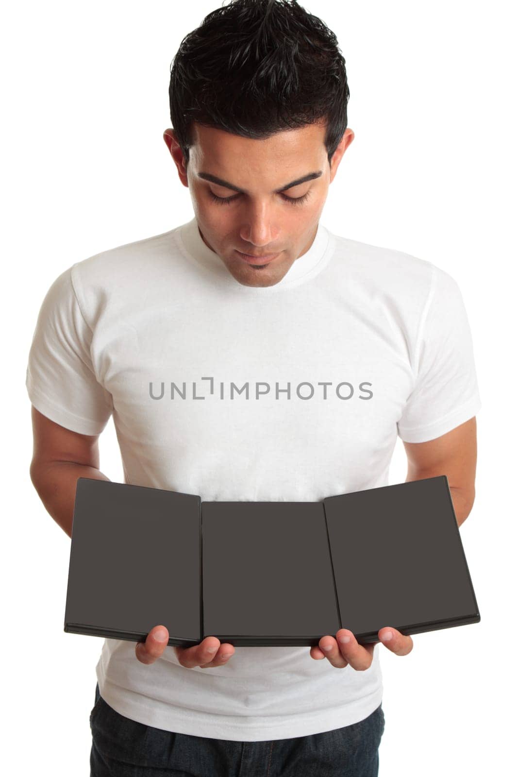 Man showing set collection of DVDs games