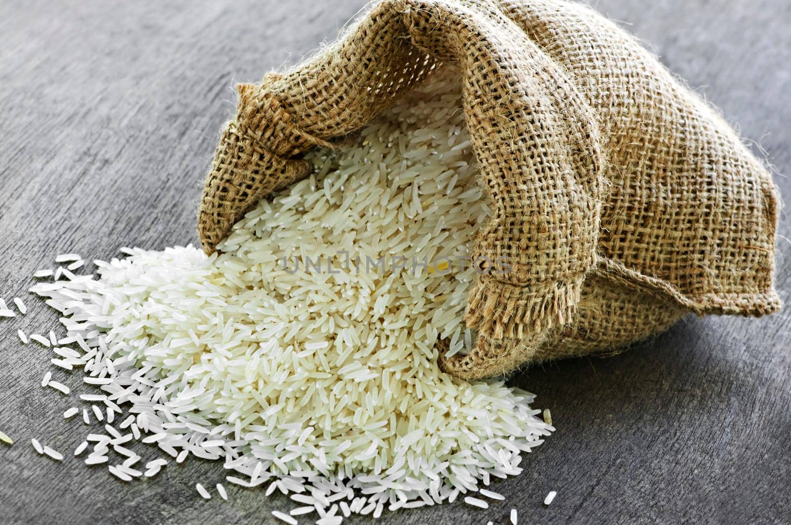 Long grain rice in burlap sack