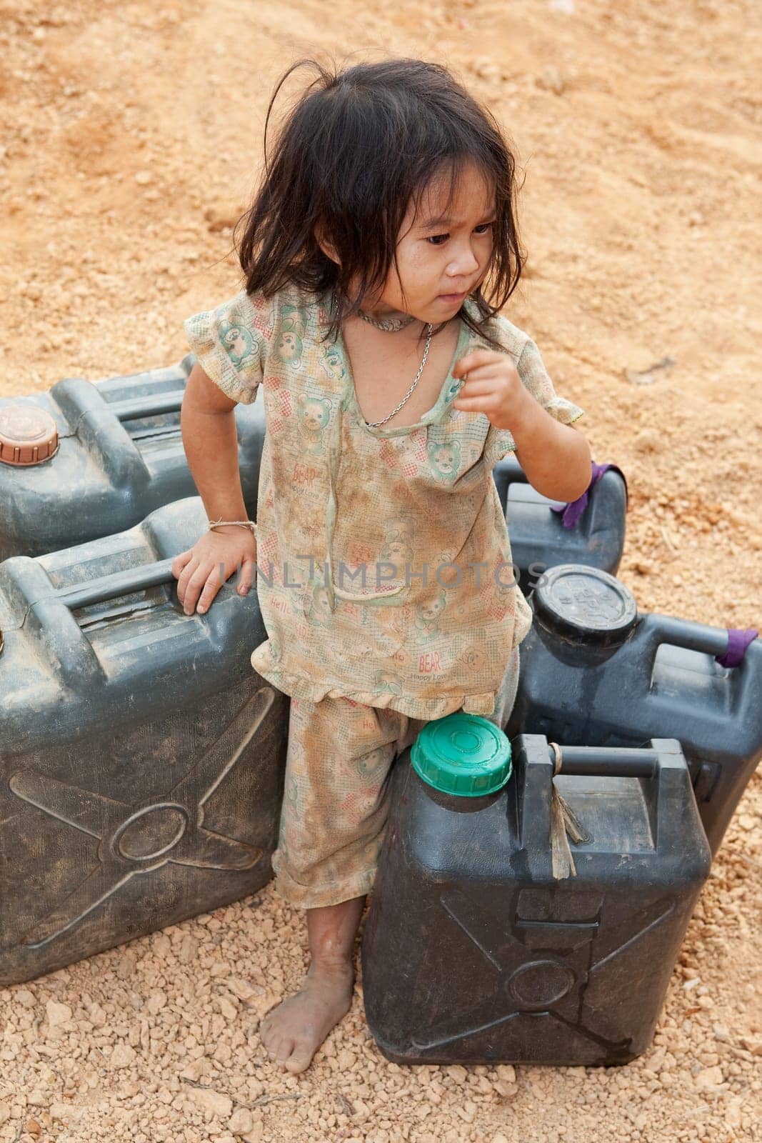 asian kid with jerry can