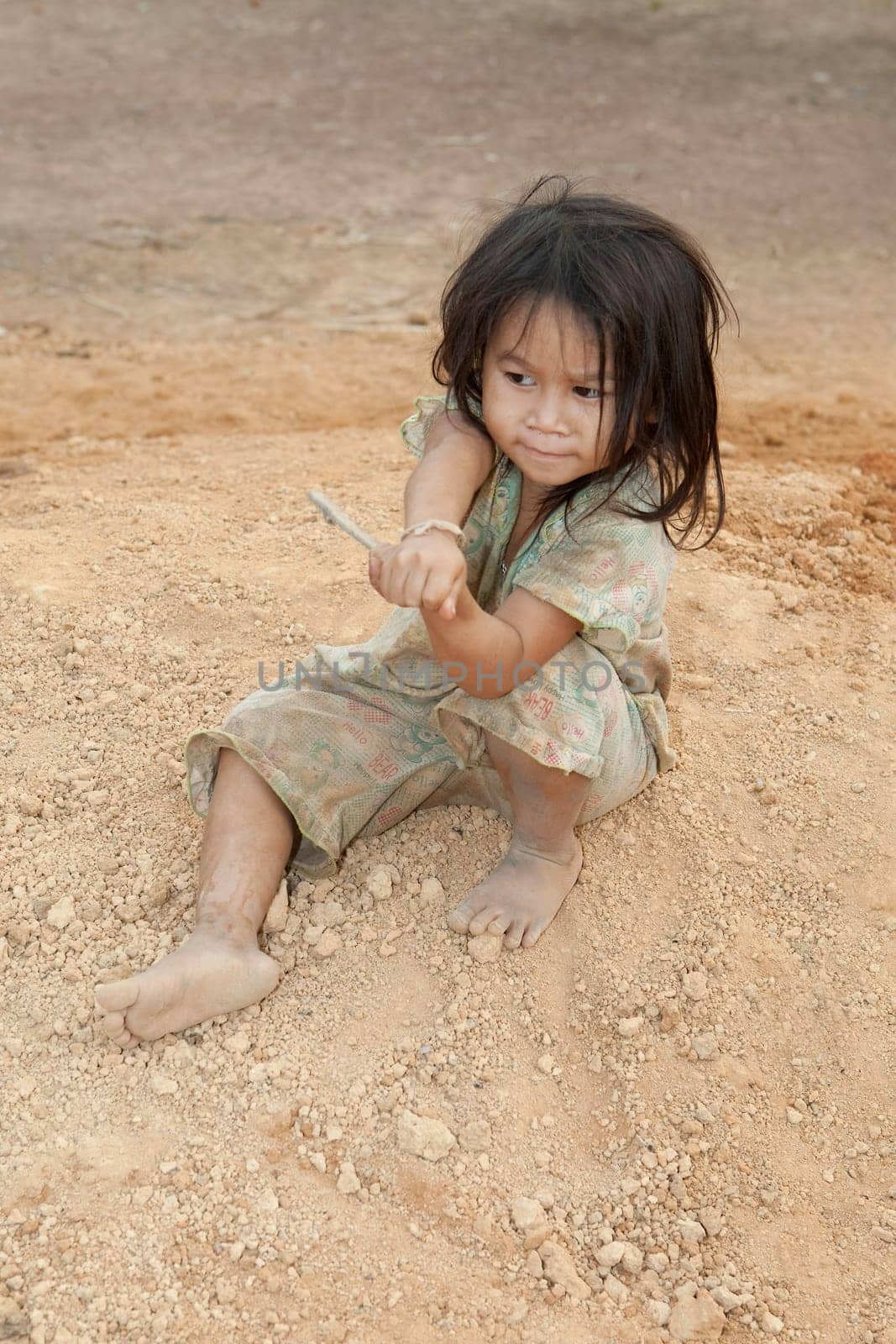Portrait of girl from Laos in poverty