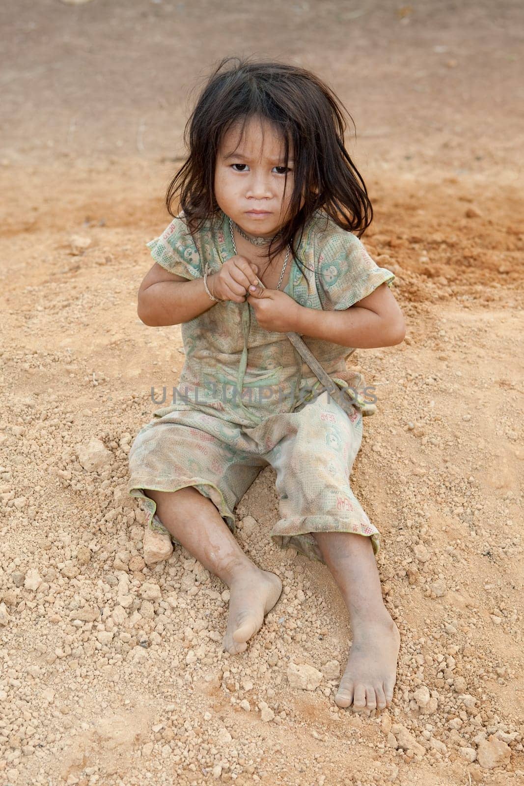 Portrait of girl from Laos in poverty