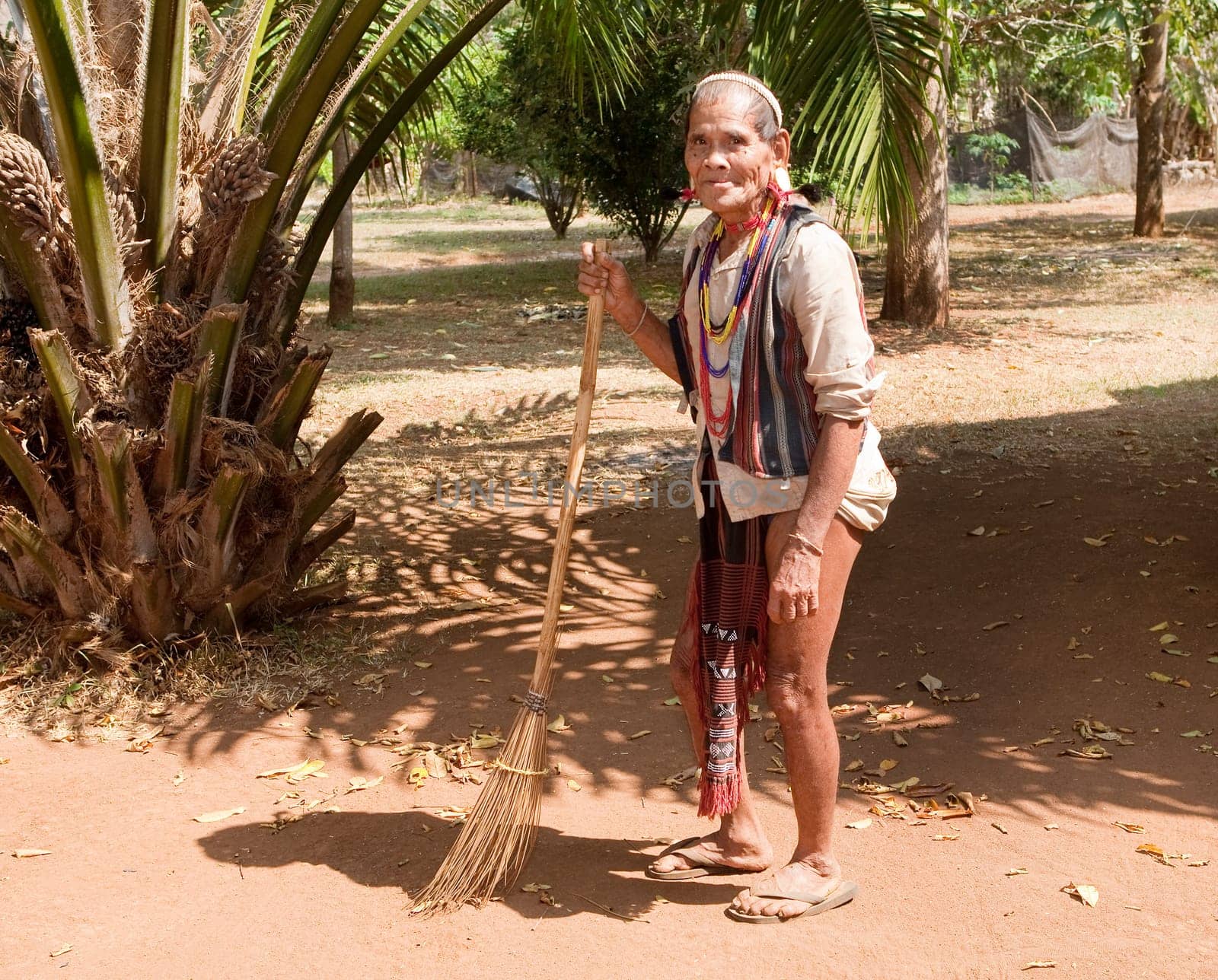 old man with broom