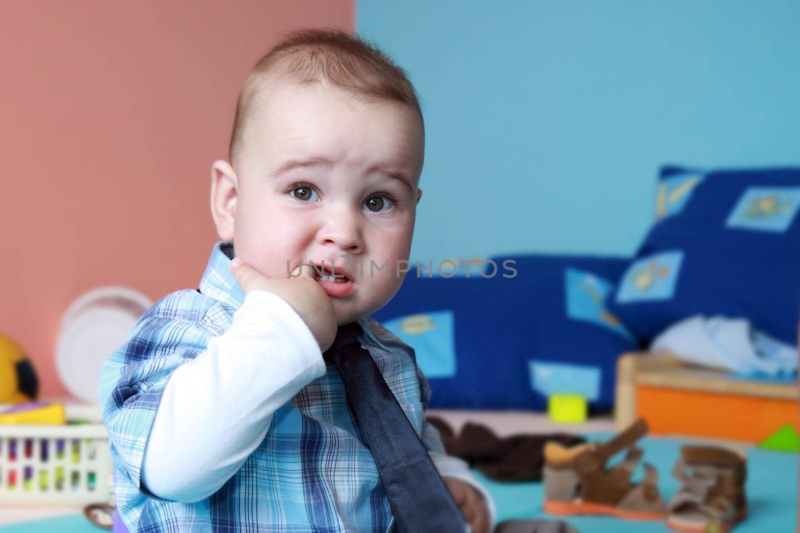 portrait years child in nurser with tie