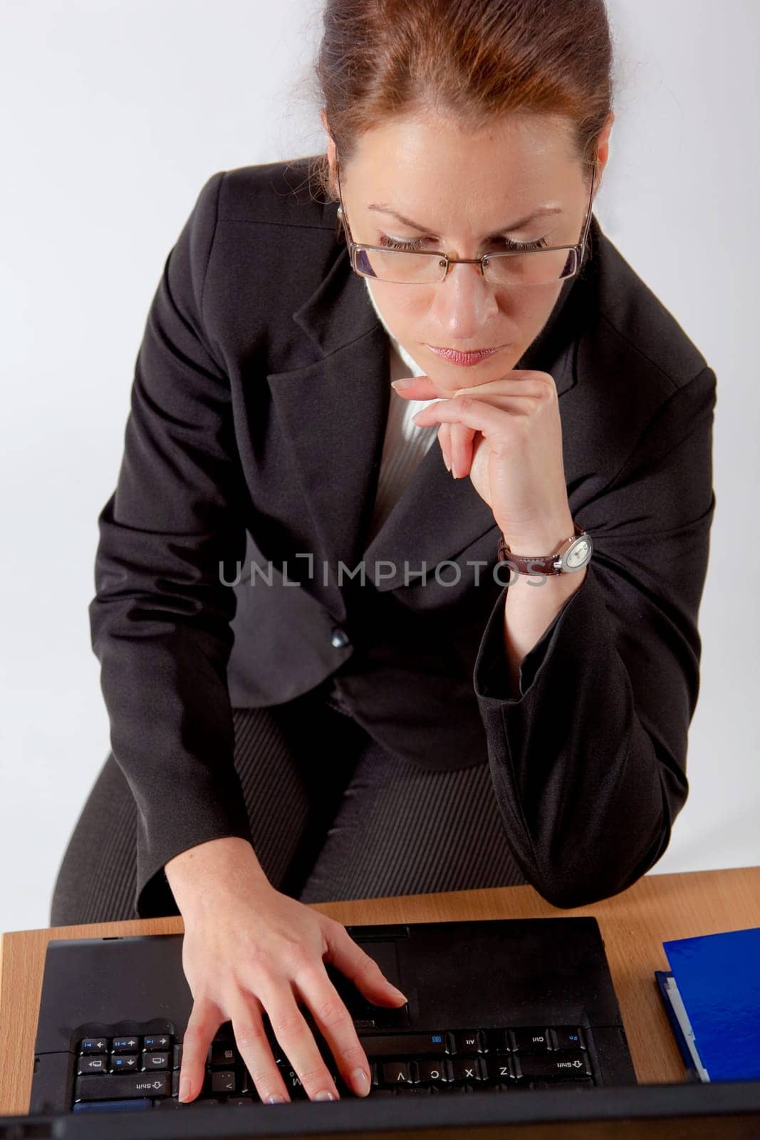 business woman walking with case
