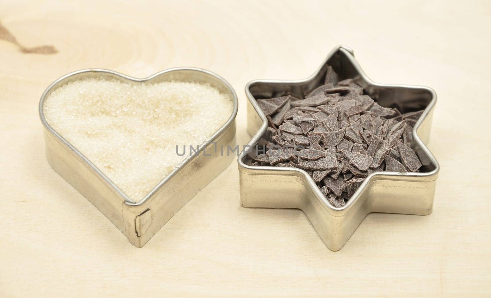 Cookie cutter with sugar and chocolate