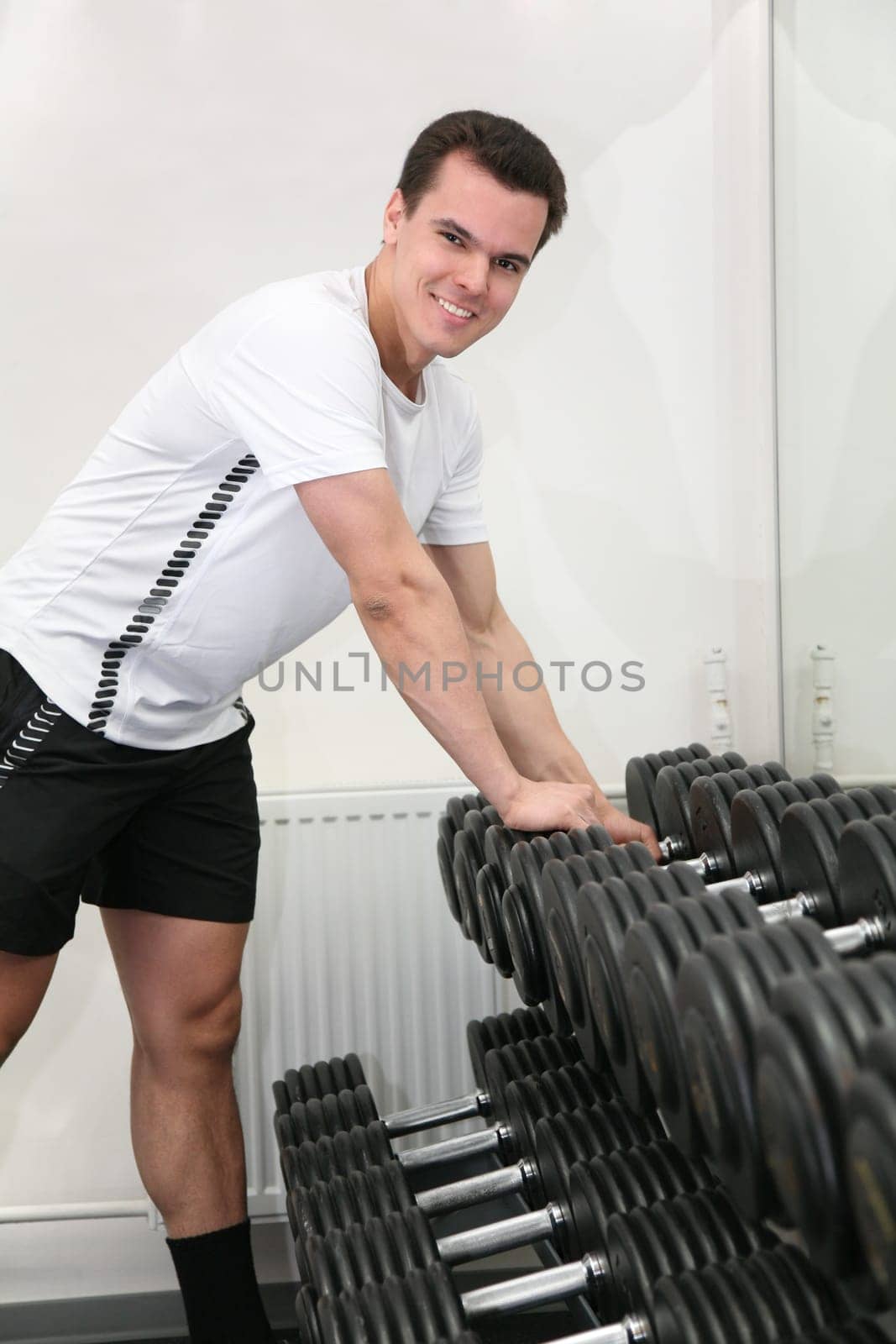 gym man with dumbbell