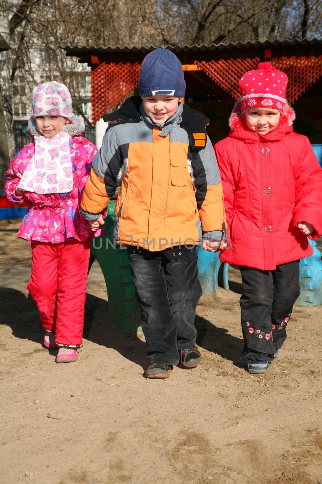 boy with girls in kindergarten