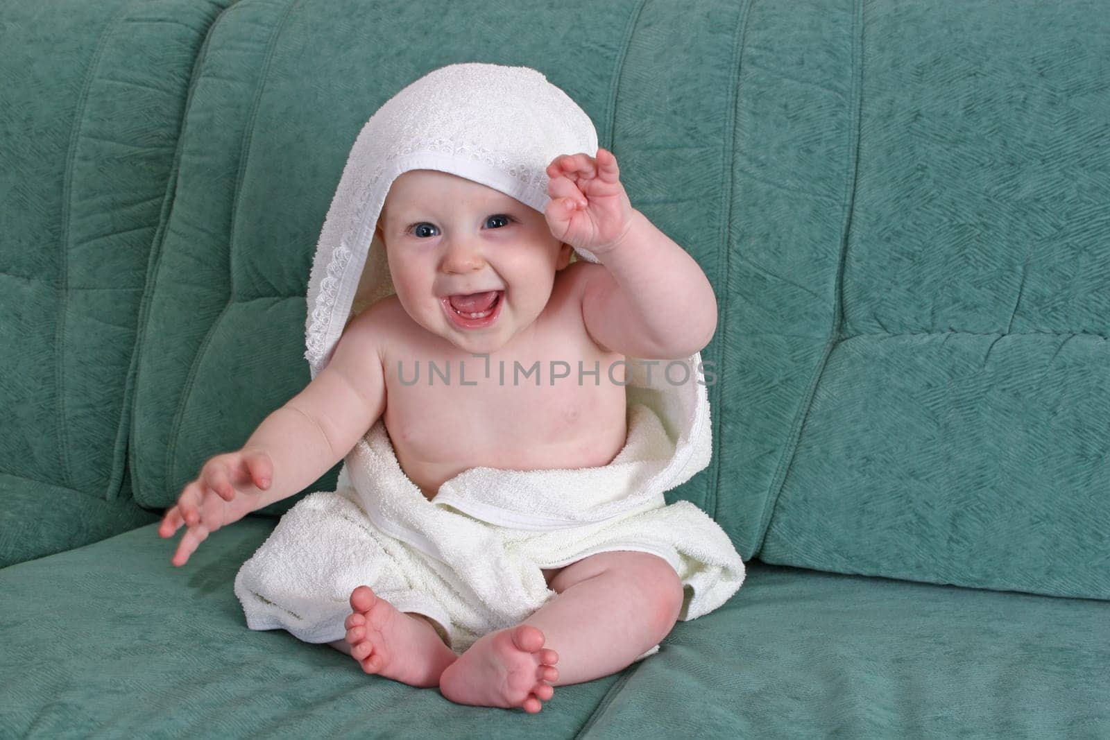 baby with towel