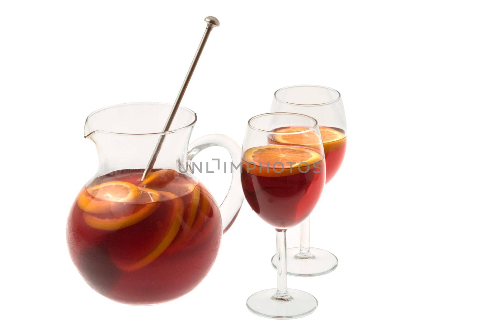 Red Wine Sangria in pitcher with stemware on white background
