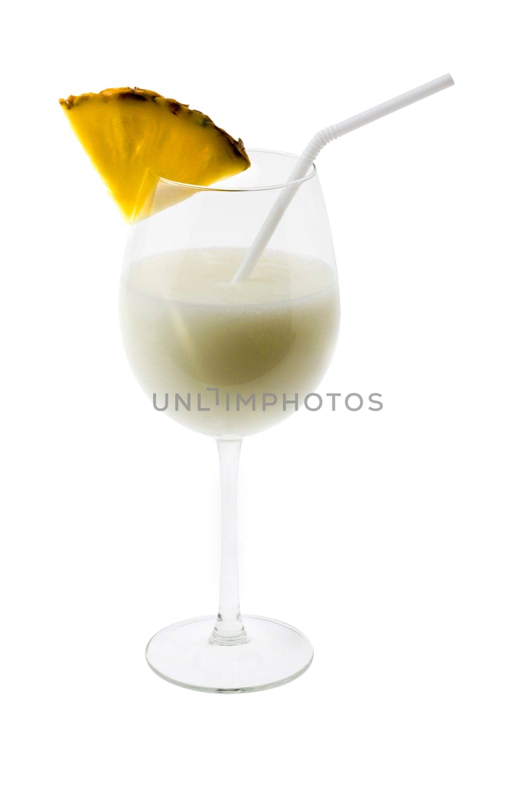 Pina Colada mixed drink with umbrella garnish on white background
