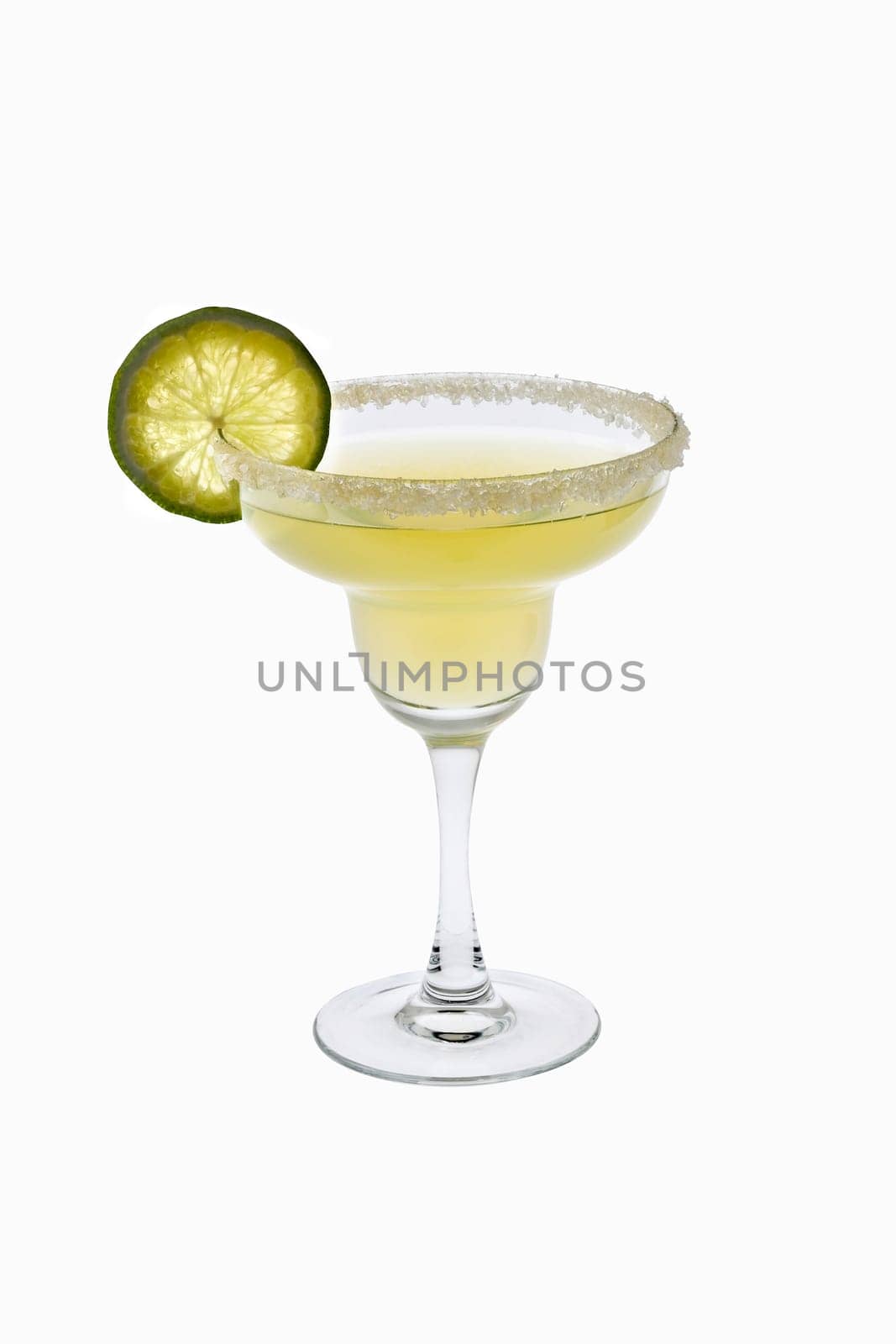 Margarita mixed drink with salted rim and lime slice garnish on a white background