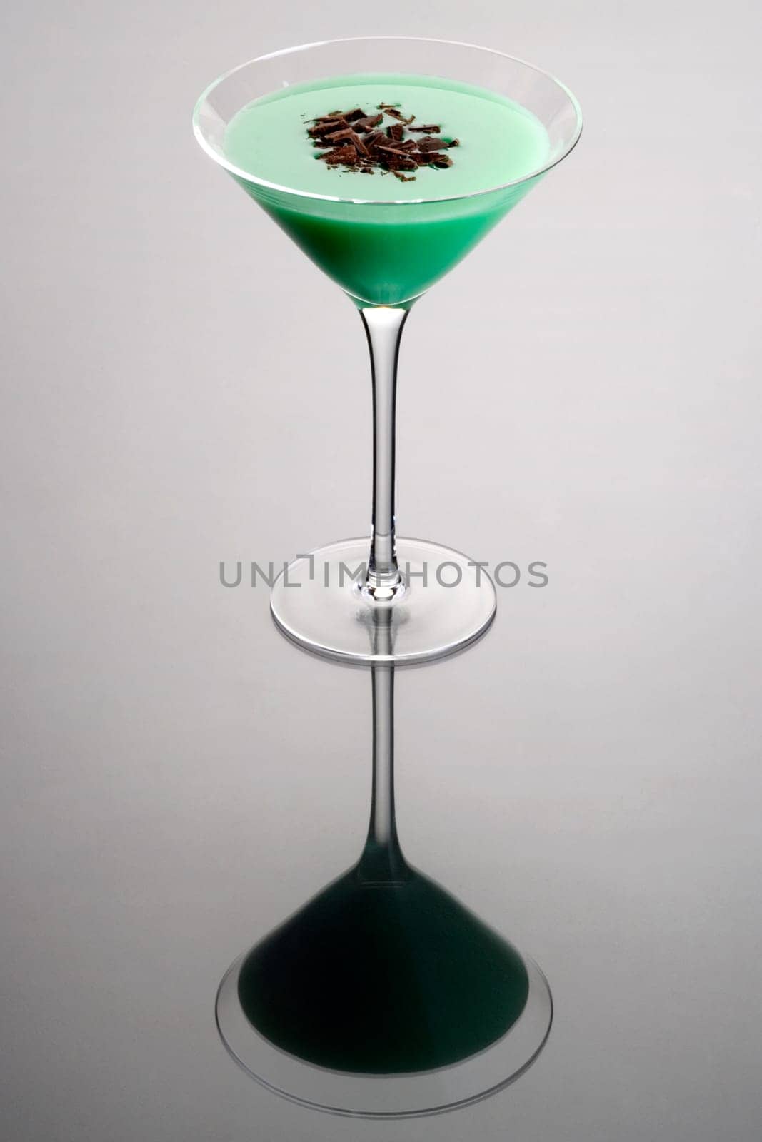 Grasshopper with shaved chocolate garnish on grey background