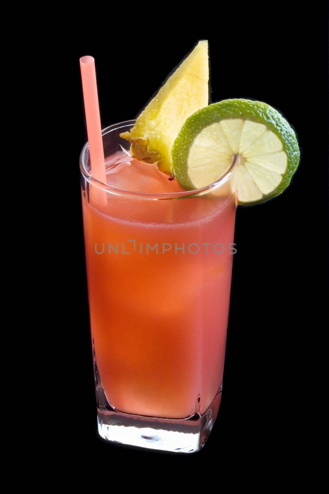 Bay Breeze mixed drink with garnish on plain background with reflection