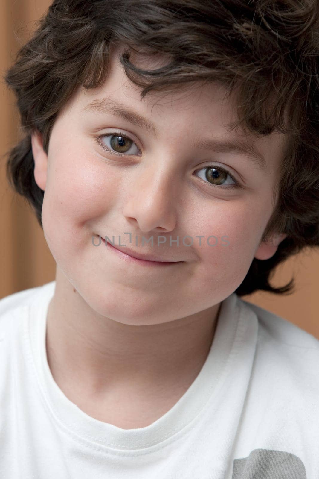 Adorable child with white shirt smiling