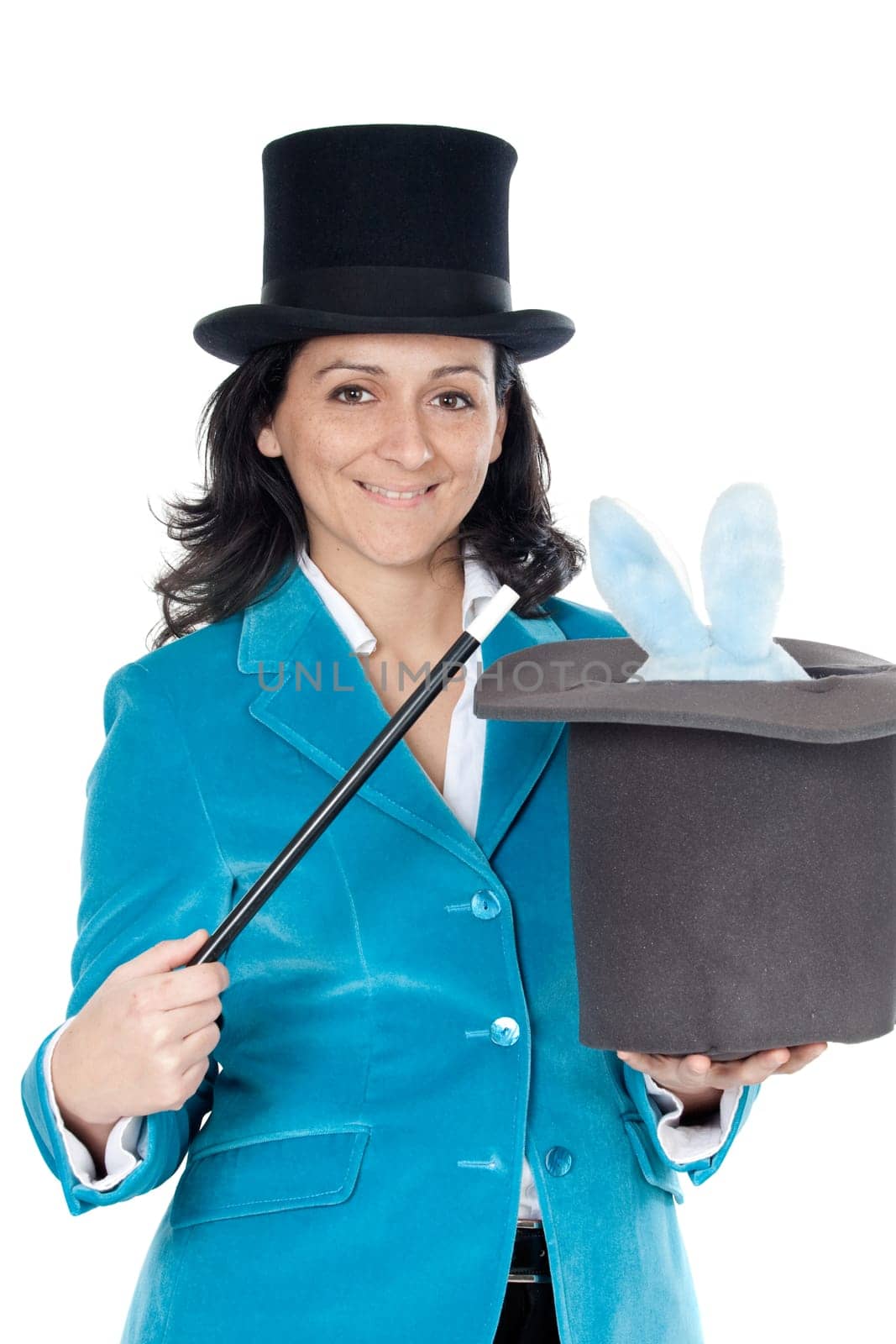 Attractive business woman with a magic wand and hat