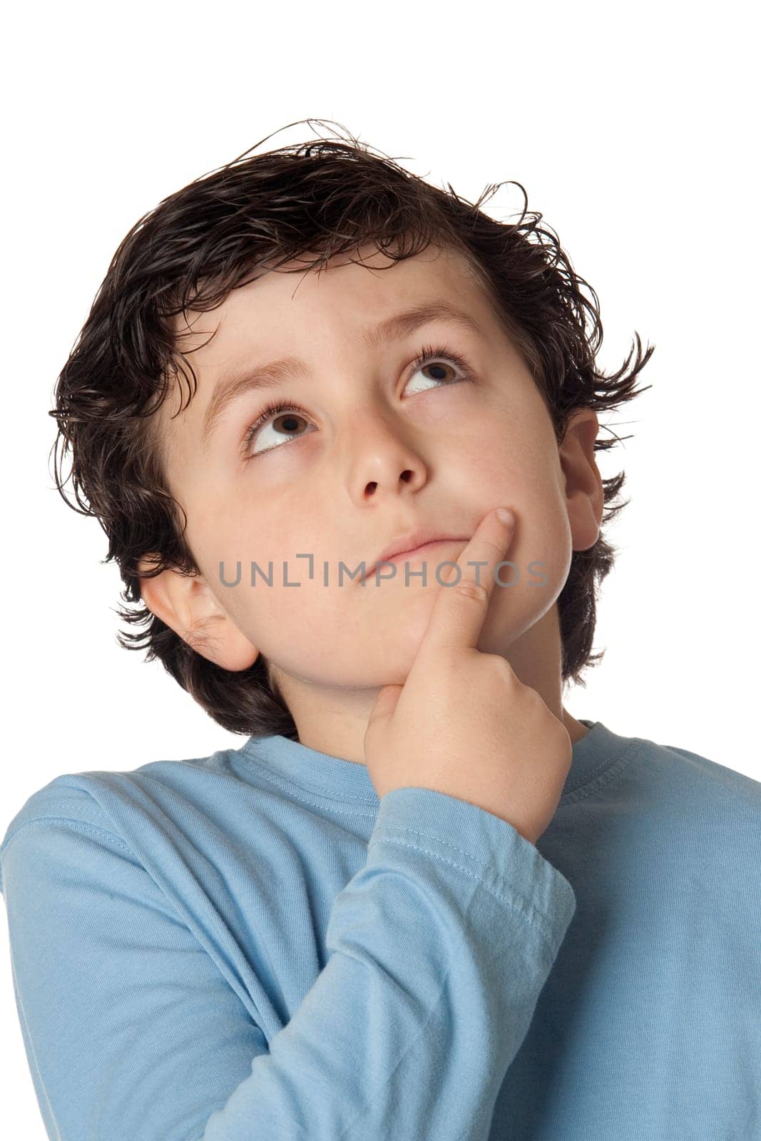 Funny child with blue shirt thinking