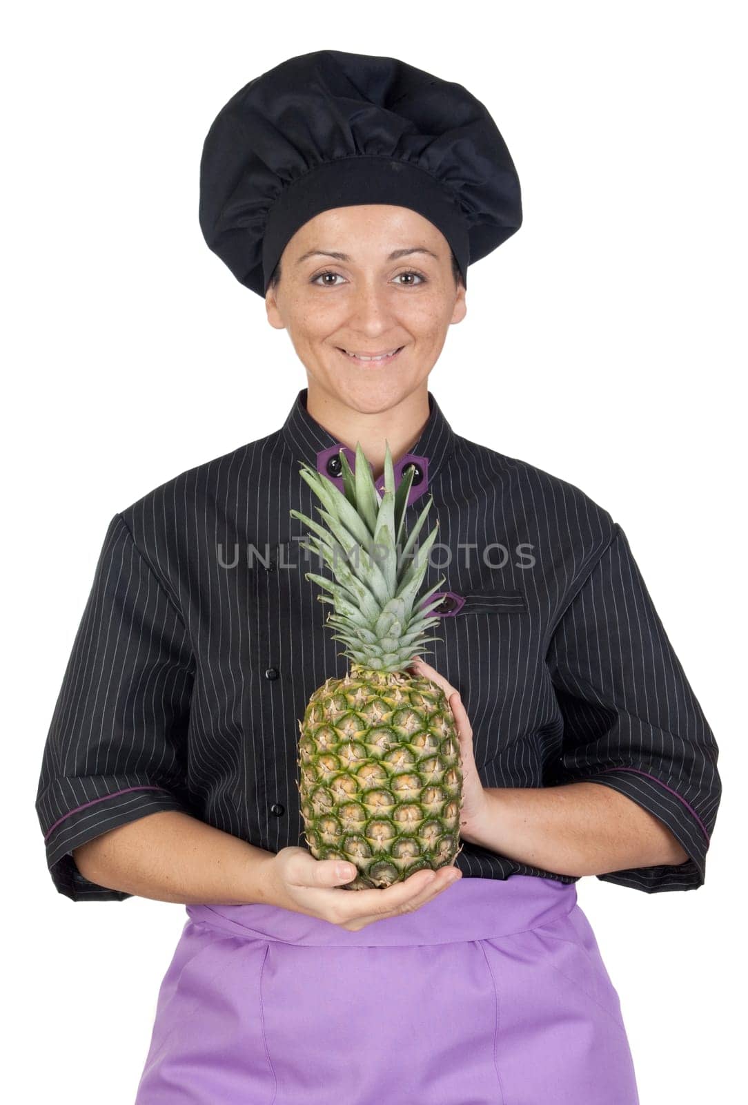 Pretty cook woman with pineapple