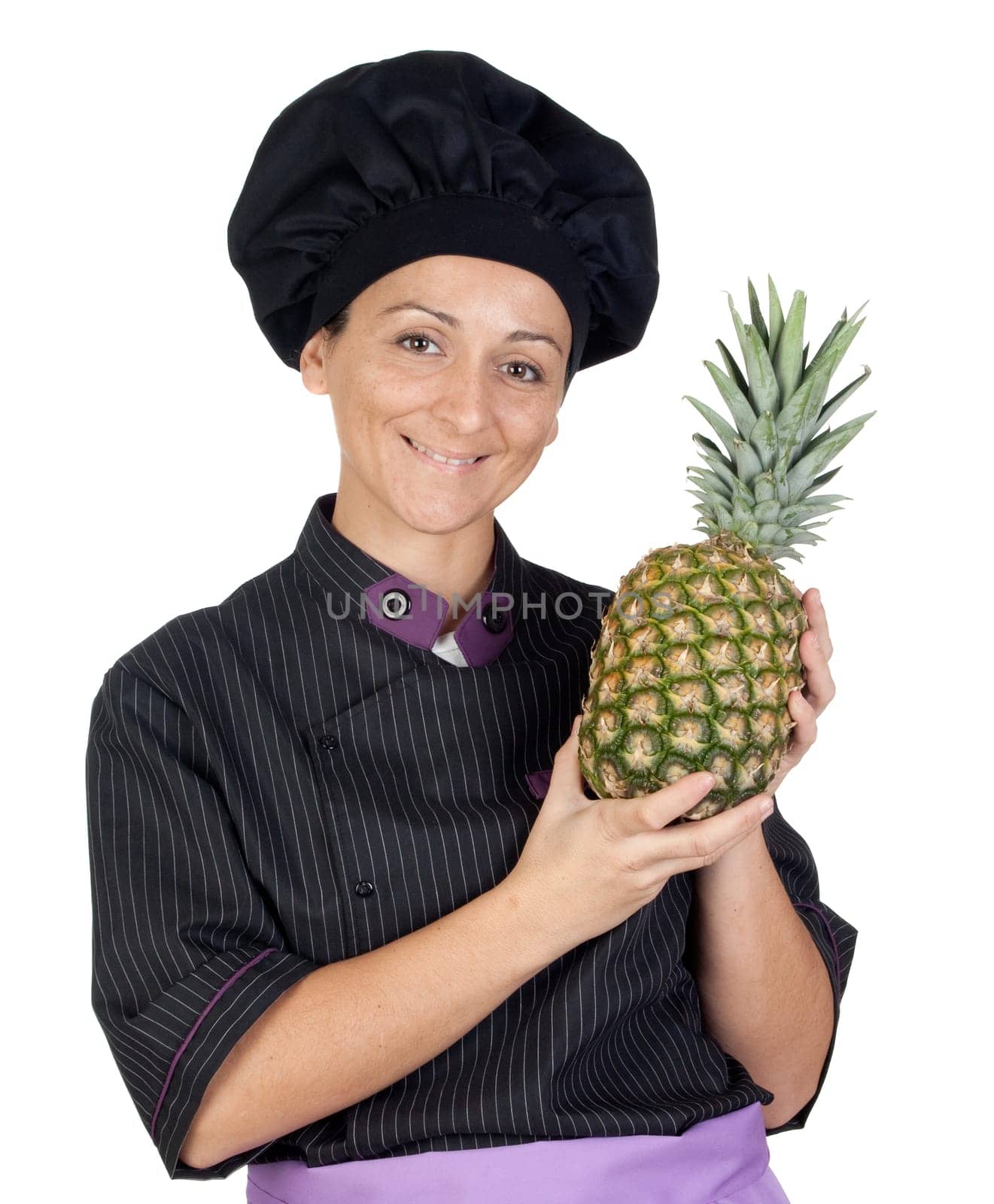 Pretty cook woman with pineapple