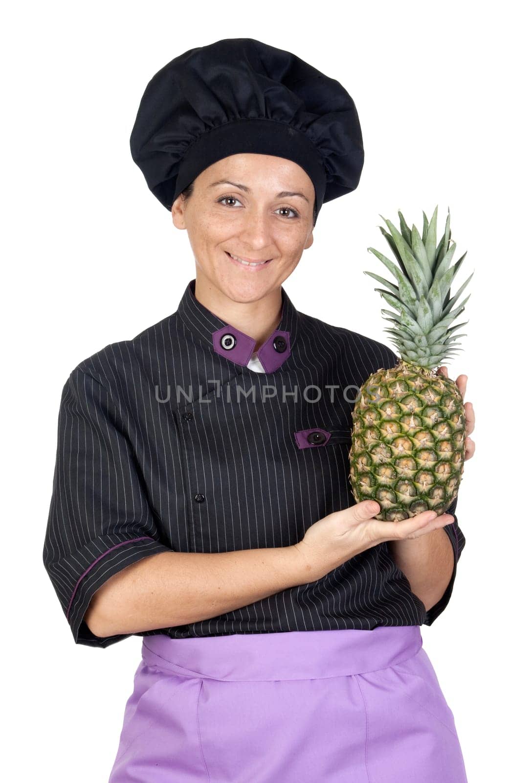 Pretty cook woman with pineapple