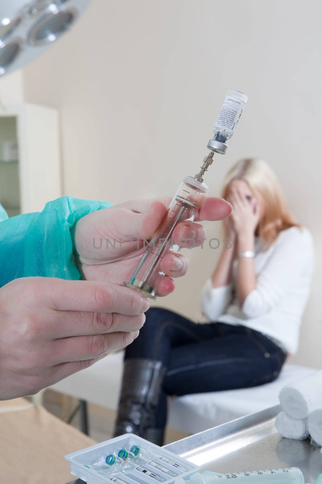 doctor listening to patients heartbeat
