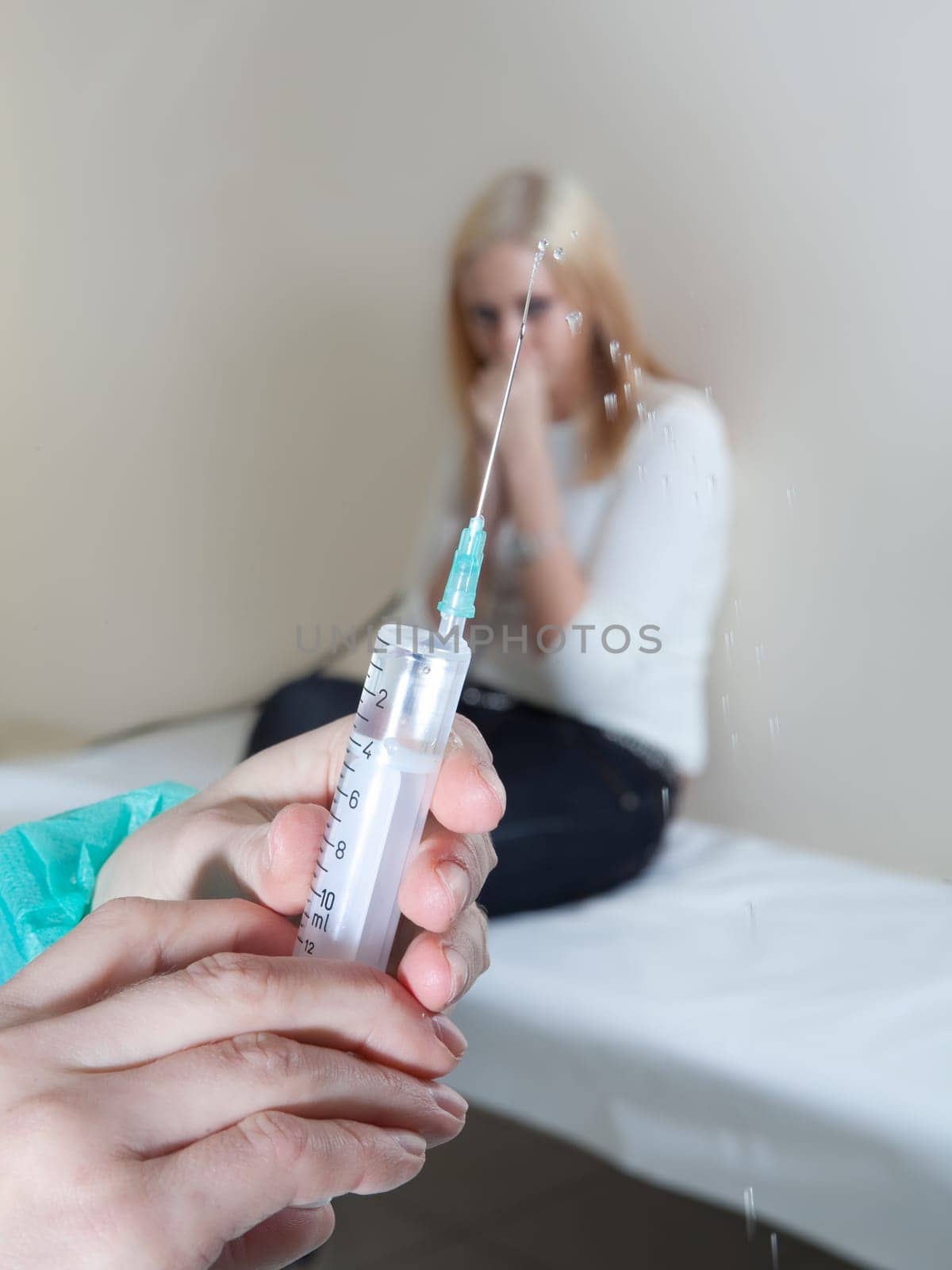 doctor listening to patients heartbeat
