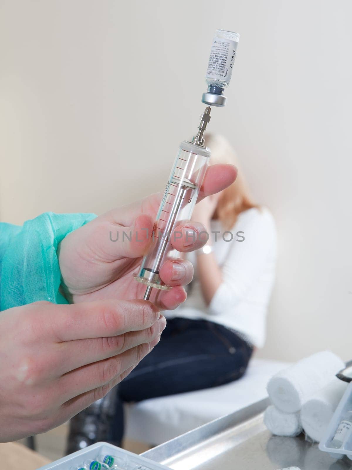 doctor listening to patients heartbeat
