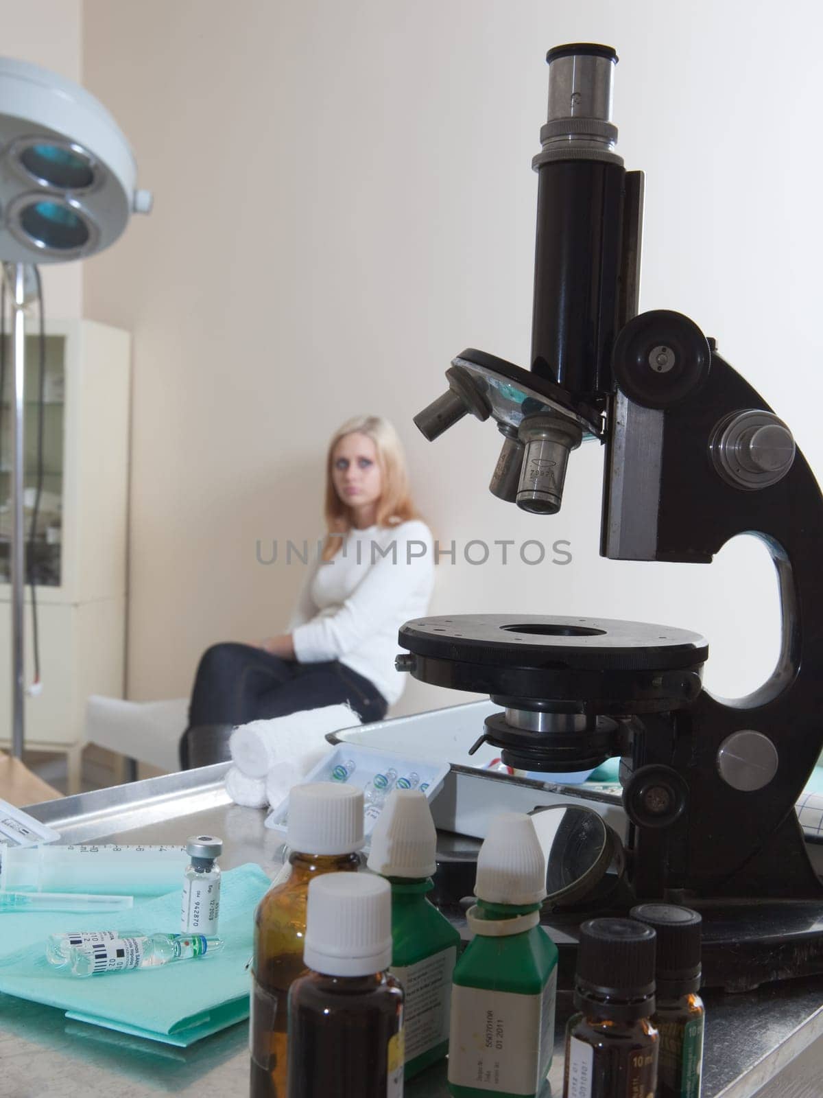 doctor listening to patients heartbeat