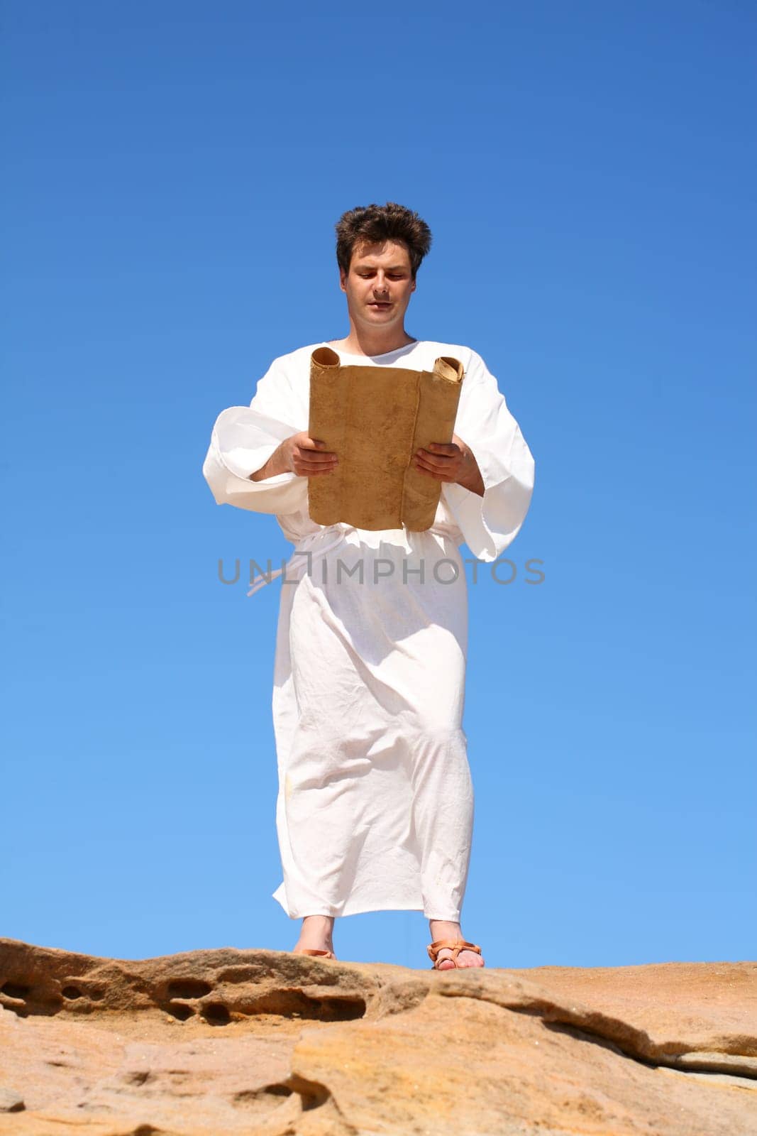 Man in robe reading