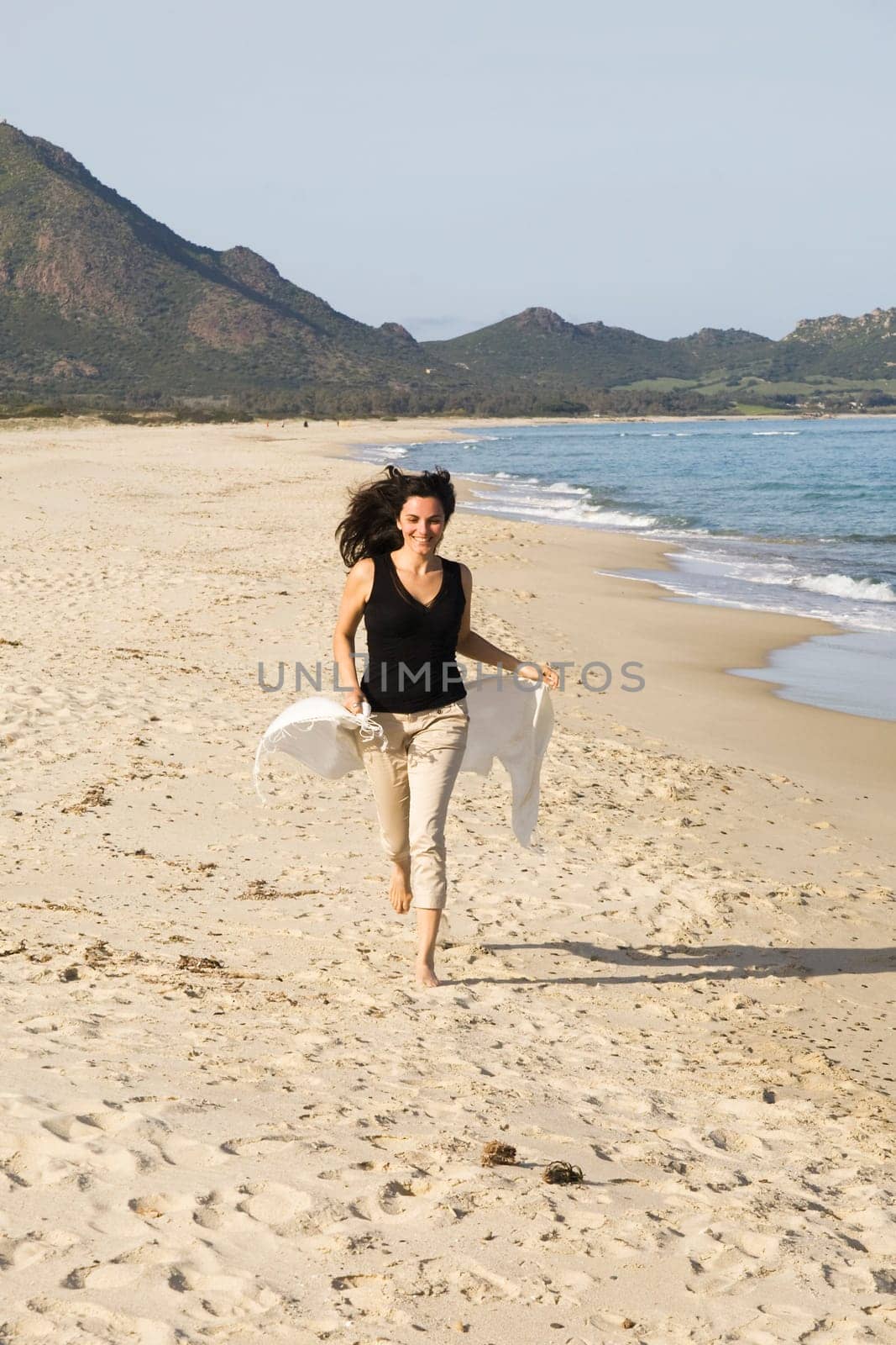 Woman running on the beach