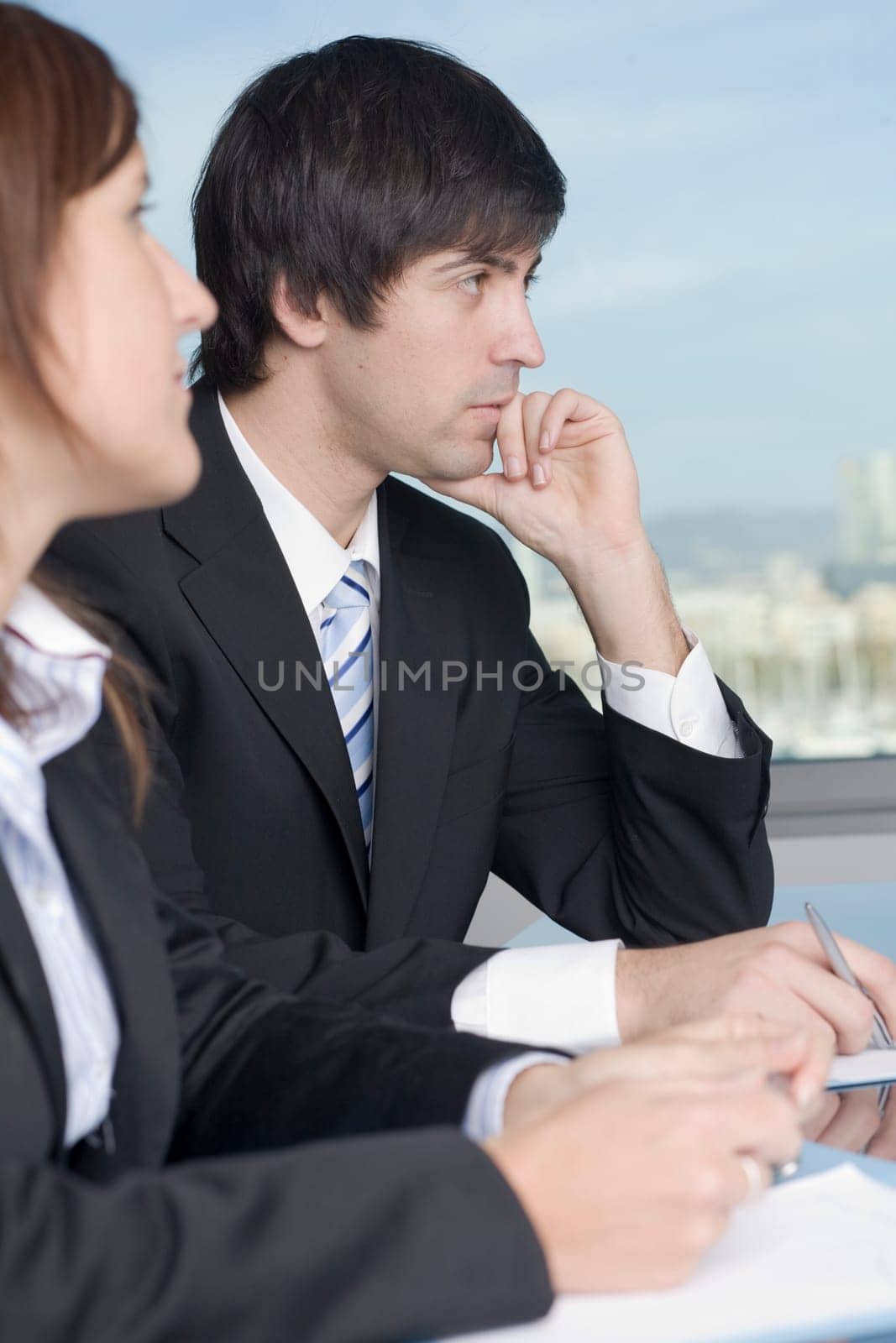 Businessman with assistant laughing
