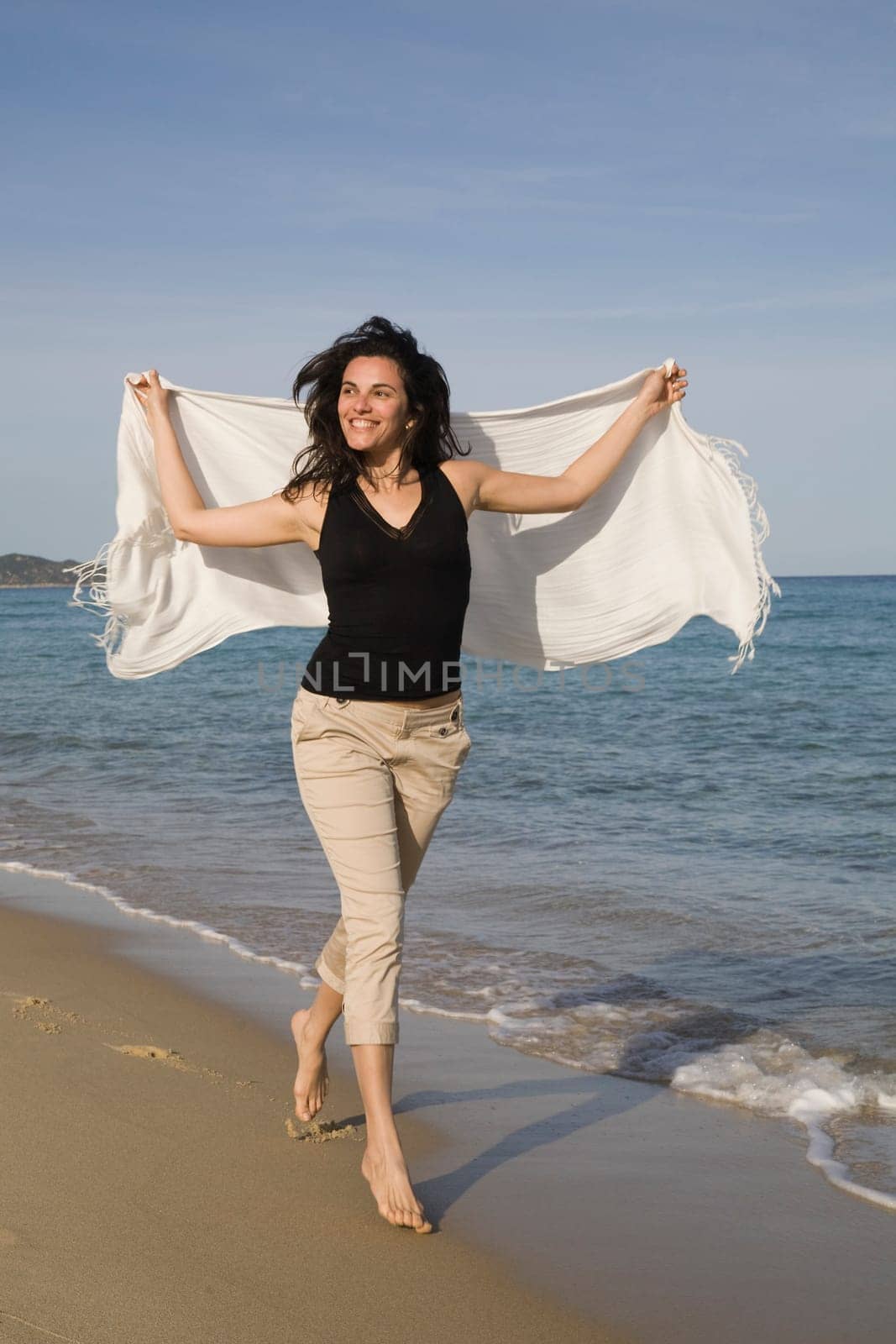 Woman running on the beach