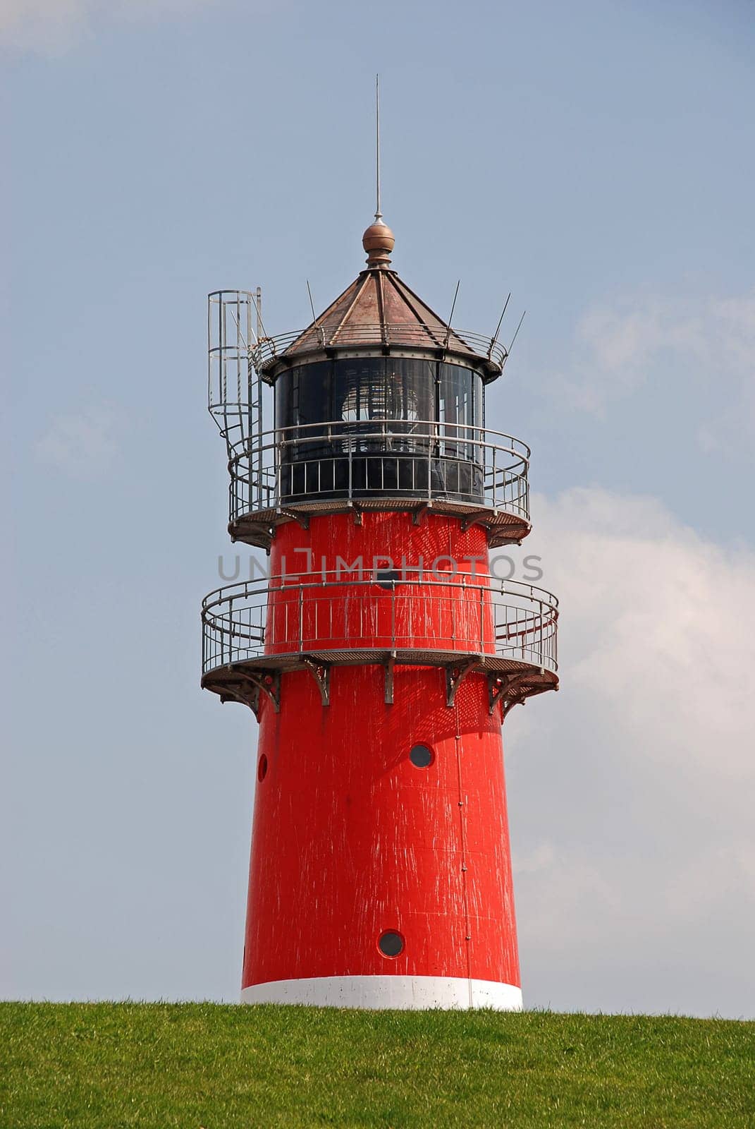 Lighthouse behind the dike