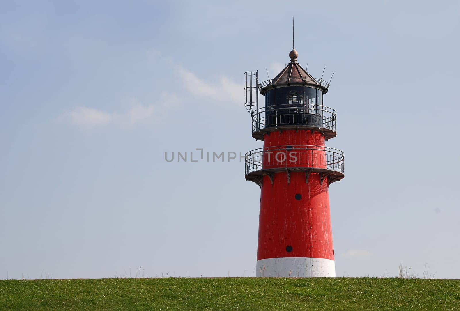 Lighthouse behind the dike