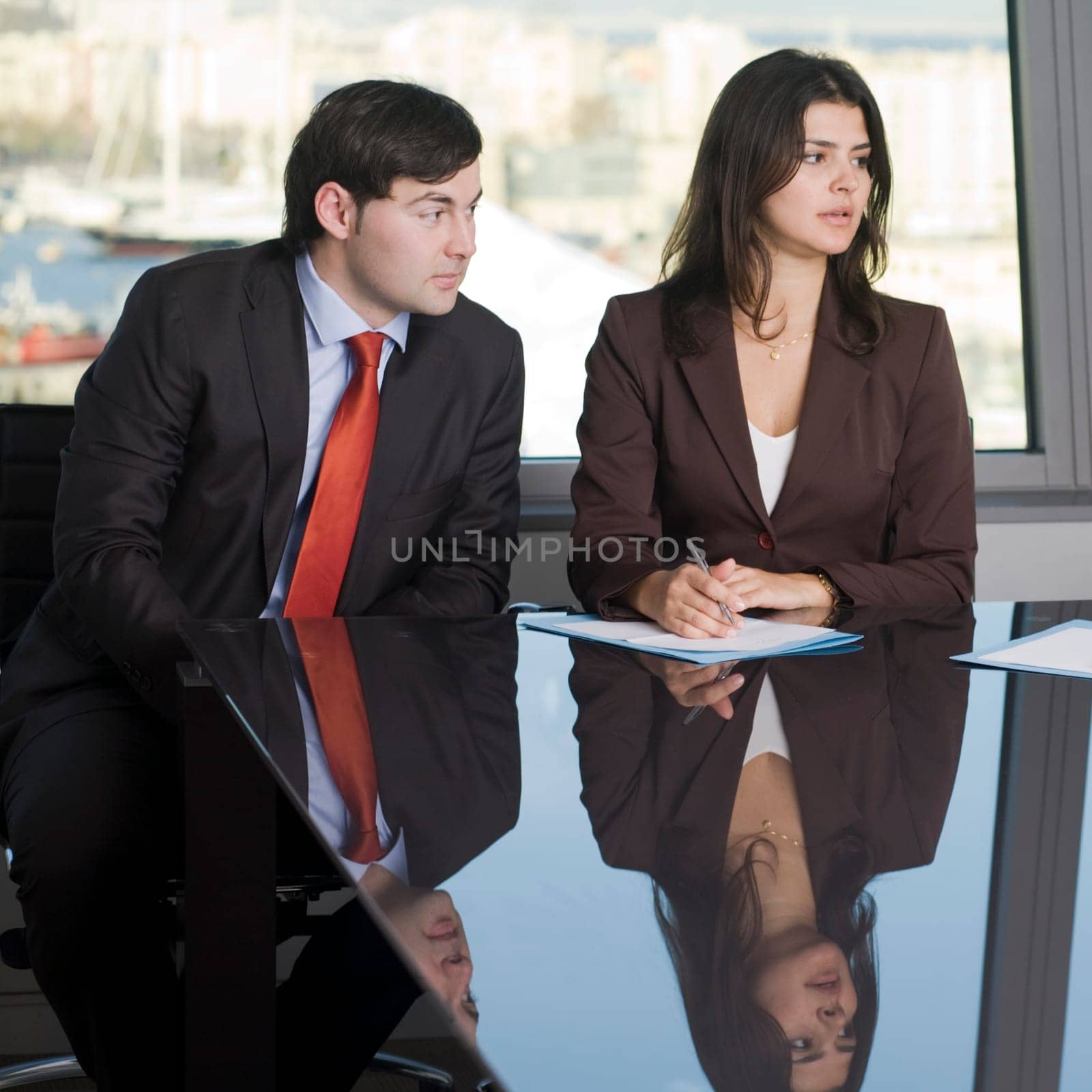 Businessman with assistant laughing