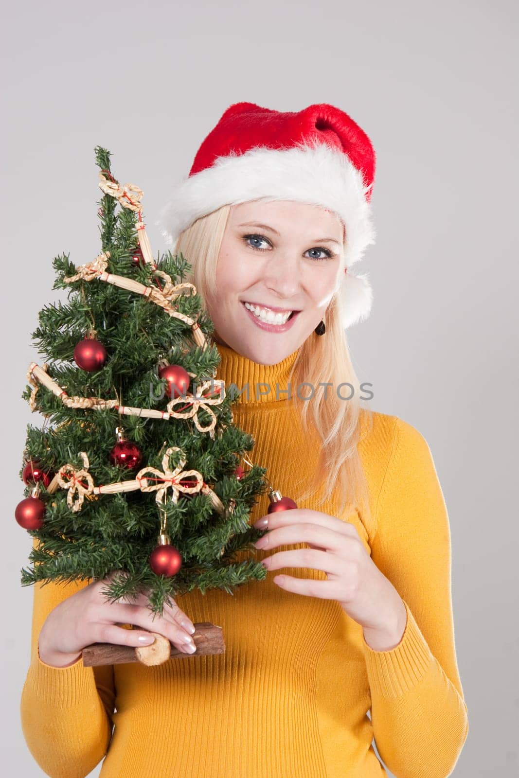 woman with christmas tree