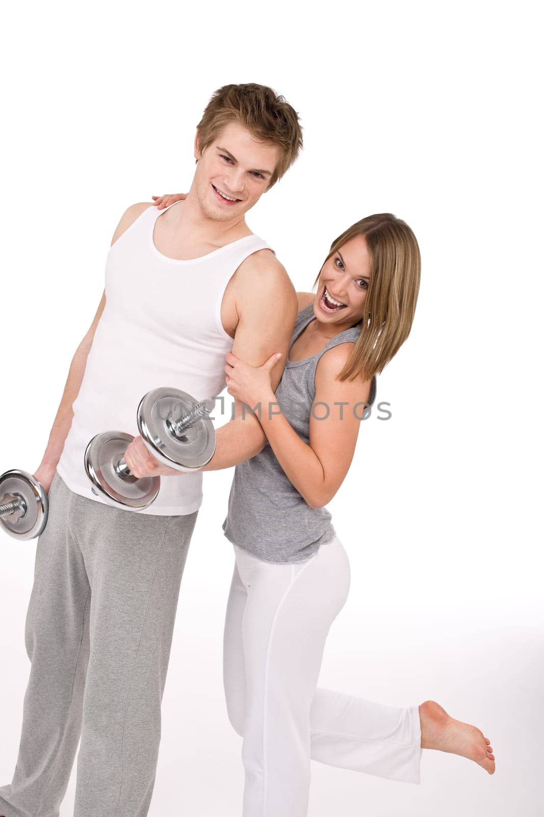 Fitness - happy couple with weights