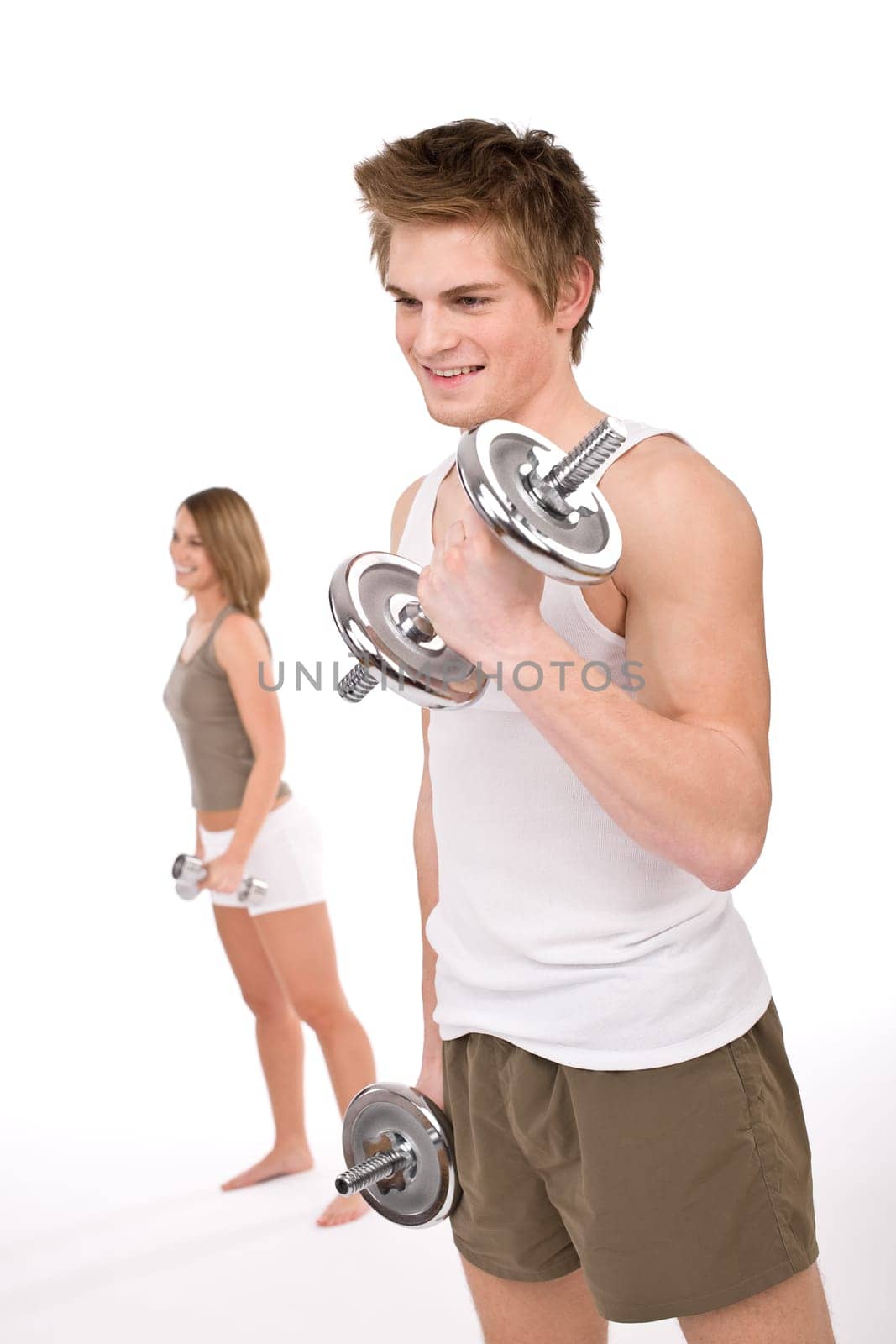 Fitness - happy couple with weights