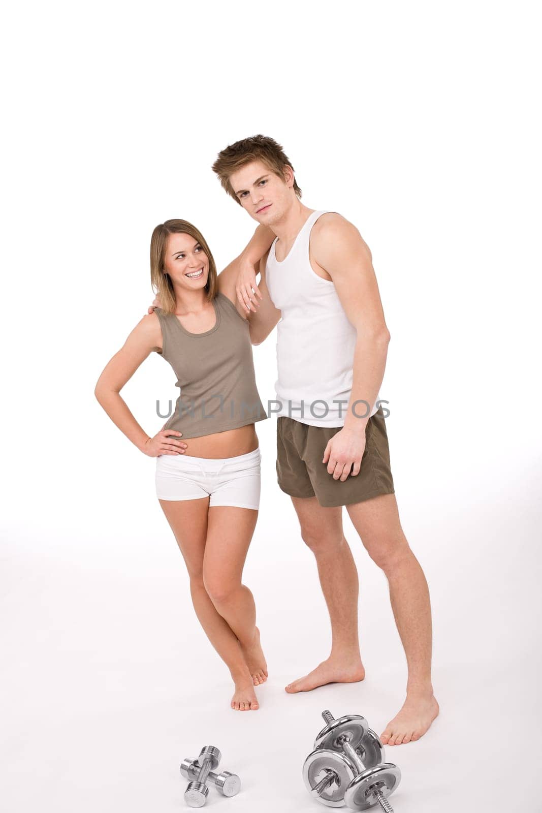 Fitness - happy couple with weights